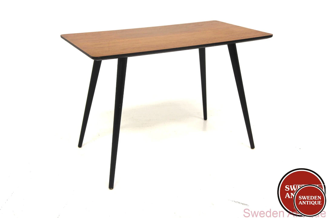 Coffee table Year: 1950s Origin: Swe. Material: Teak Black W: 75cm