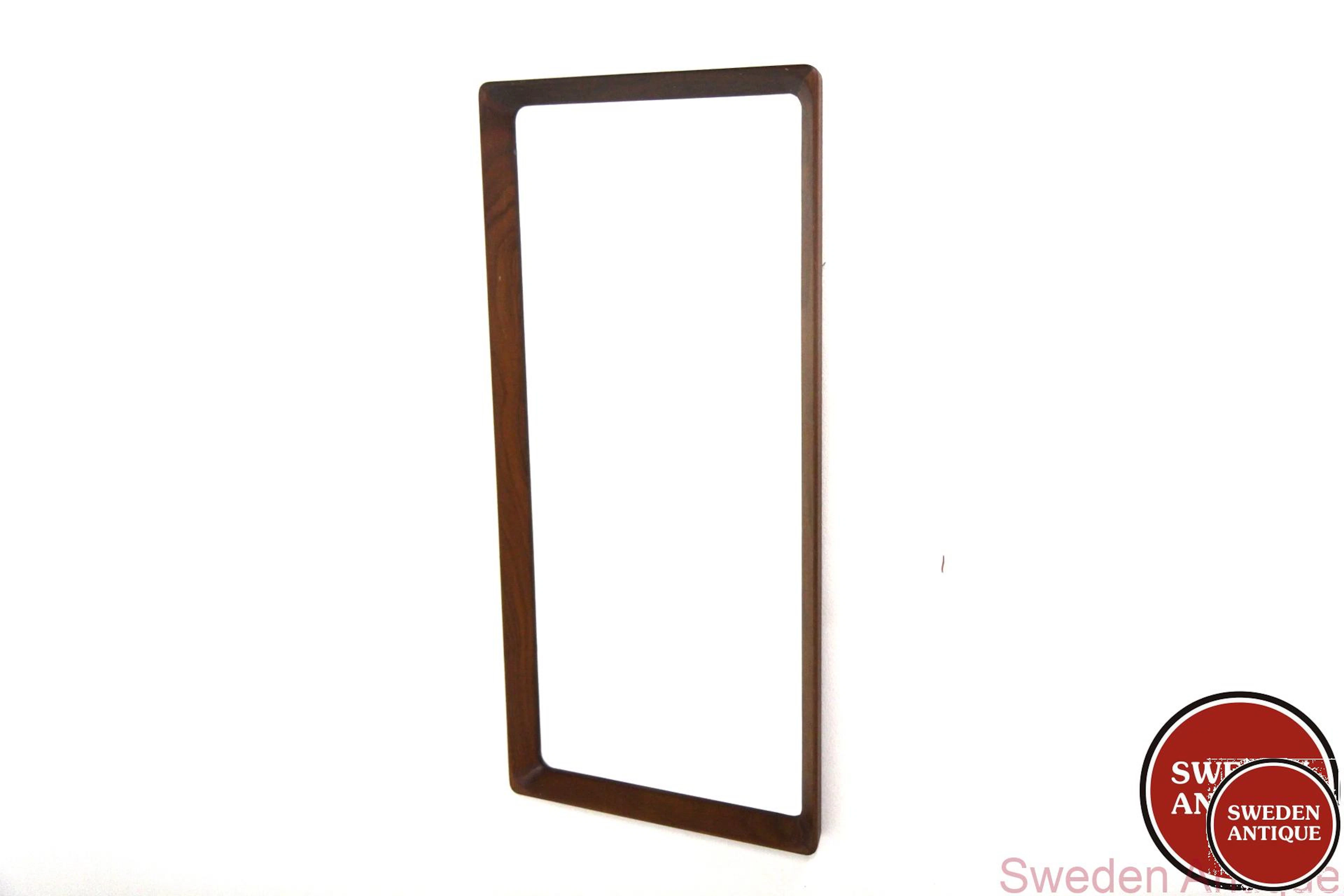 Mirror Year: 1960s Origin: Swe. Material: Walnut Glass W: 38cm D: 3,5cm H: 80cm