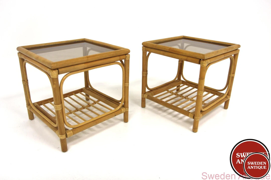 2Pcs Side tables Year: 1970s Origin: Swe. Material: Rattan Glass W: