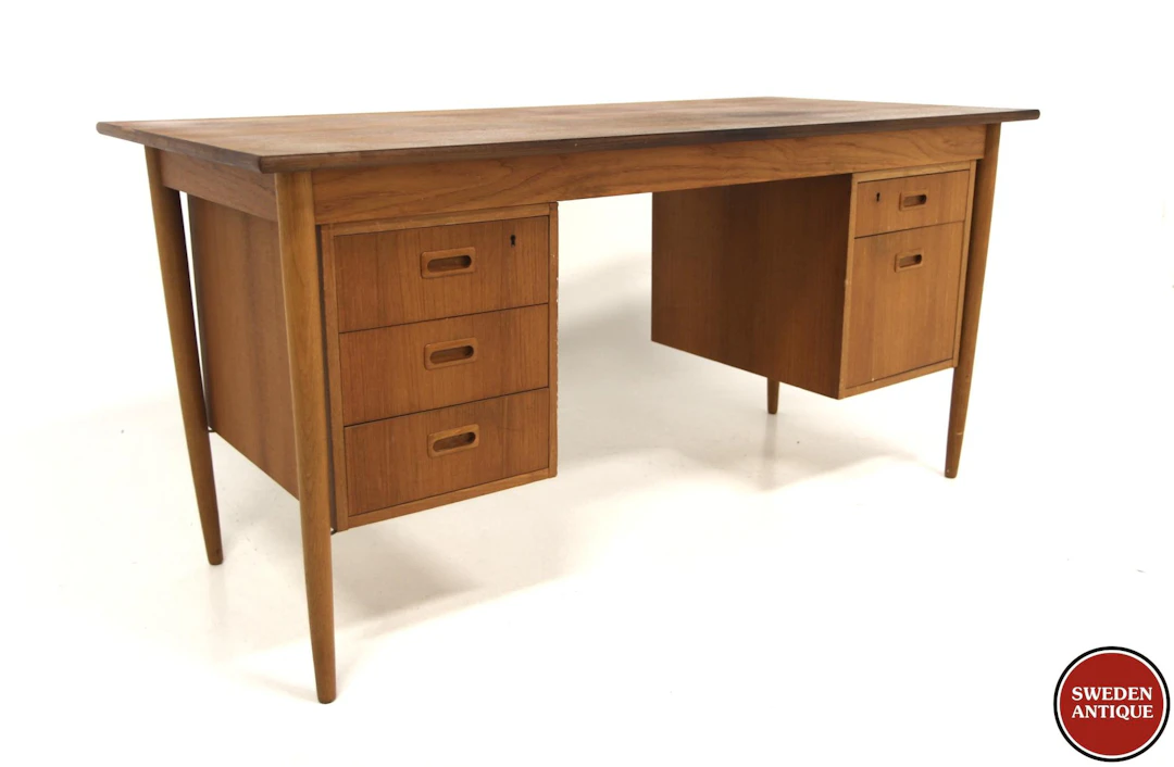 Writing desk Year: 1950s Origin: Swe. Material: Teak Oak W: 150cm