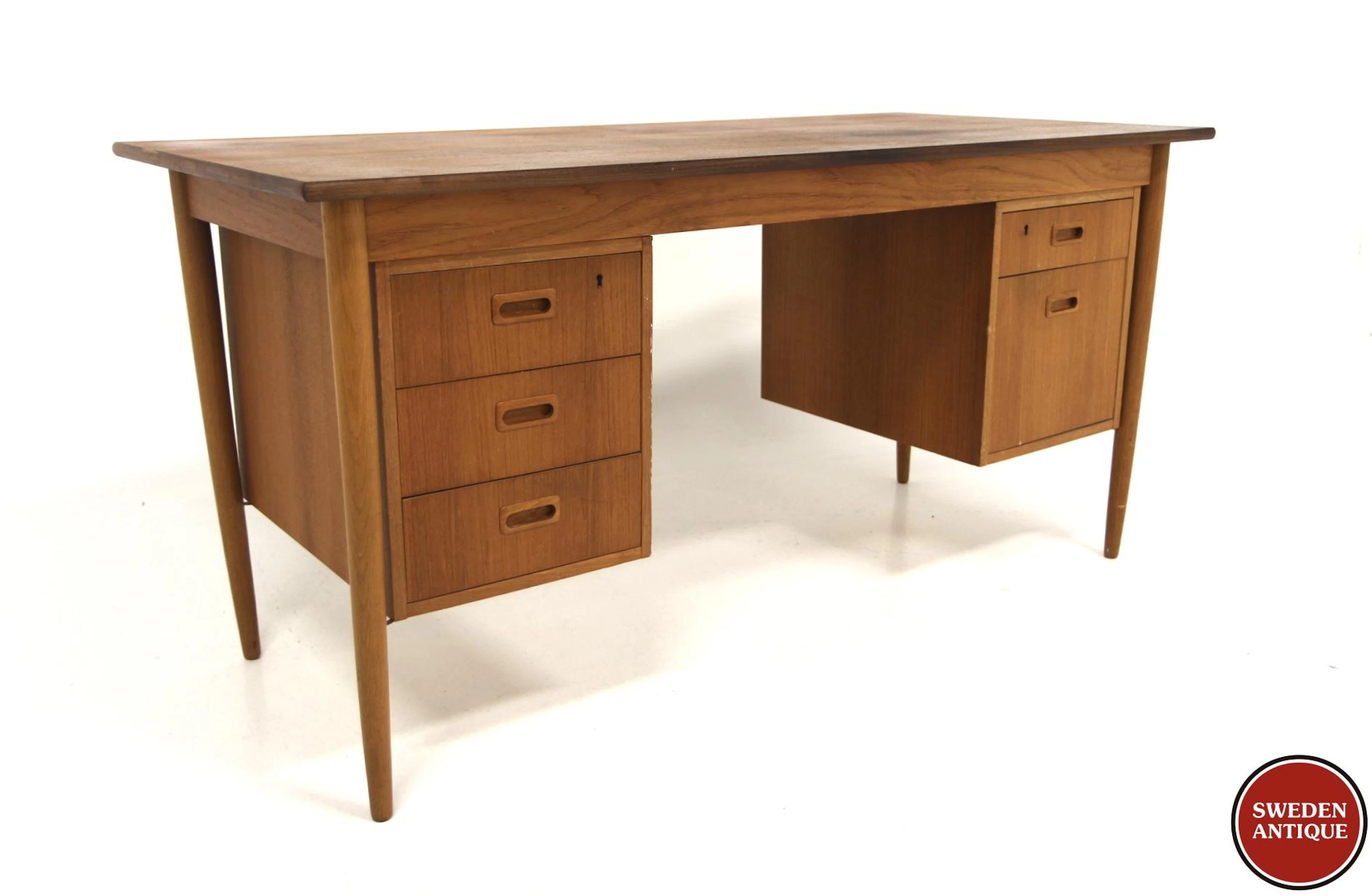 Writing desk Year: 1950s Origin: Swe. Material: Teak Oak W: 150cm