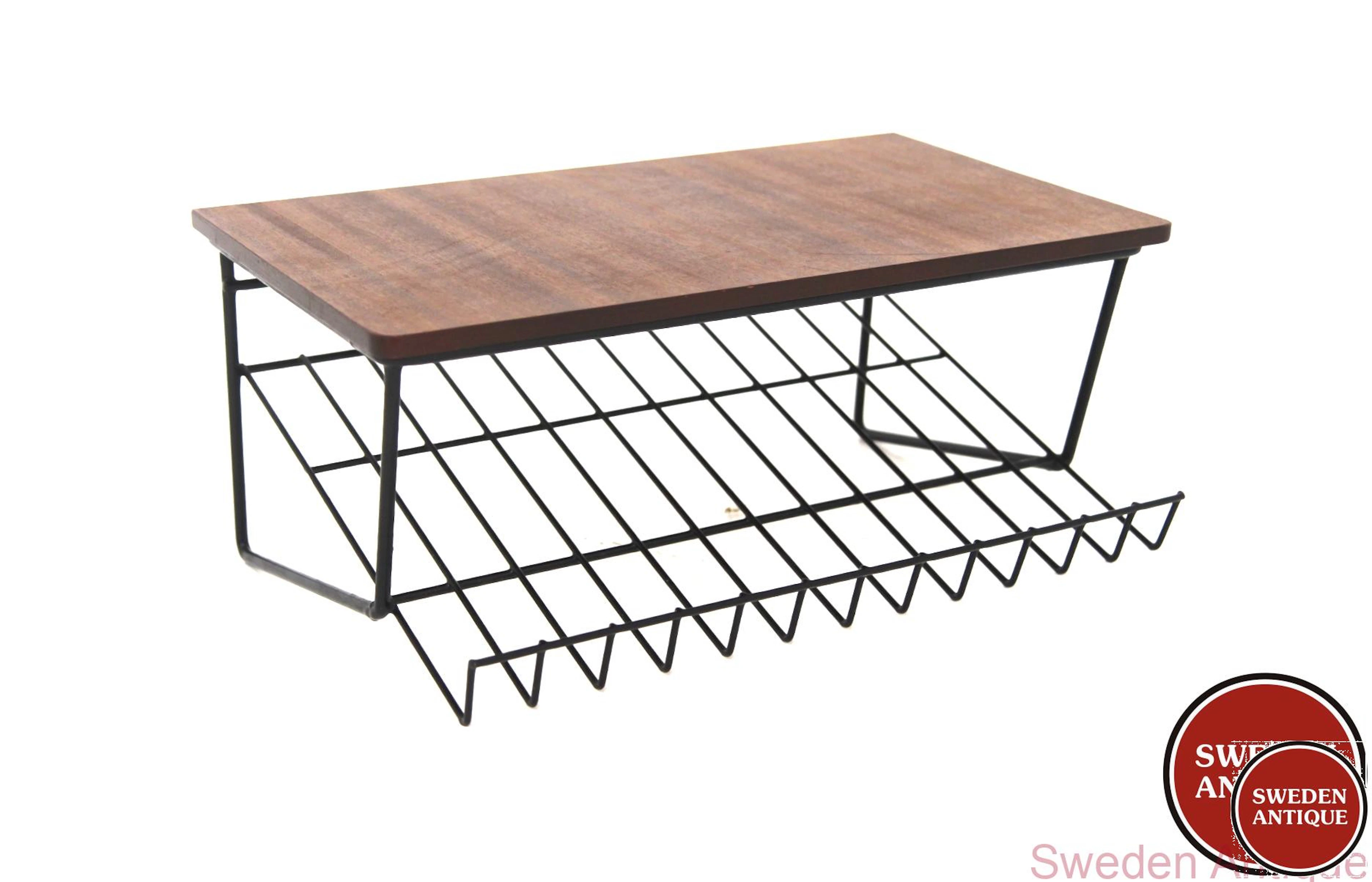 Wall shelf Year: 1950s Origin: Swe. Material: Teak Metal W: 48cm D: