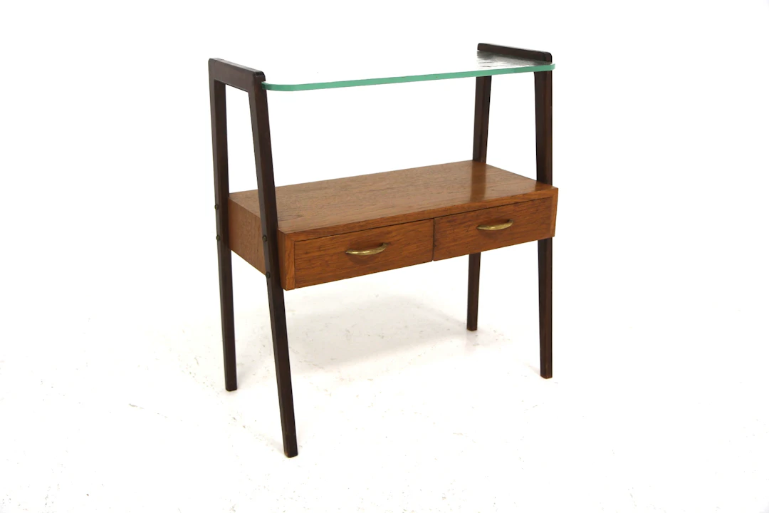 Chest of drawers Year: 1950s Origin: Swe. Material: Teak Beech Glass
