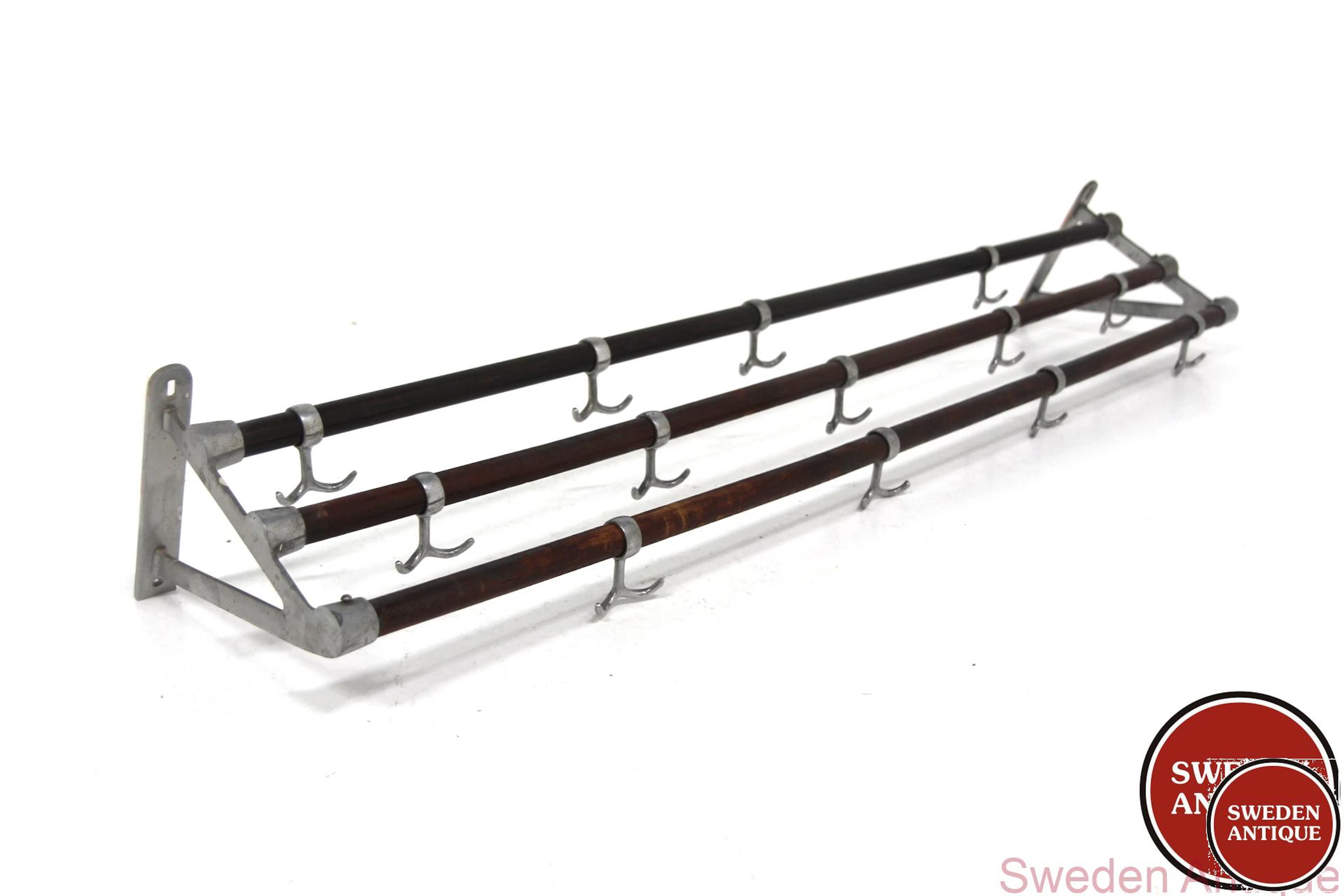 Coat hanger Year: 1950s Origin: Swe. Material: Wood Metal W: 123cm