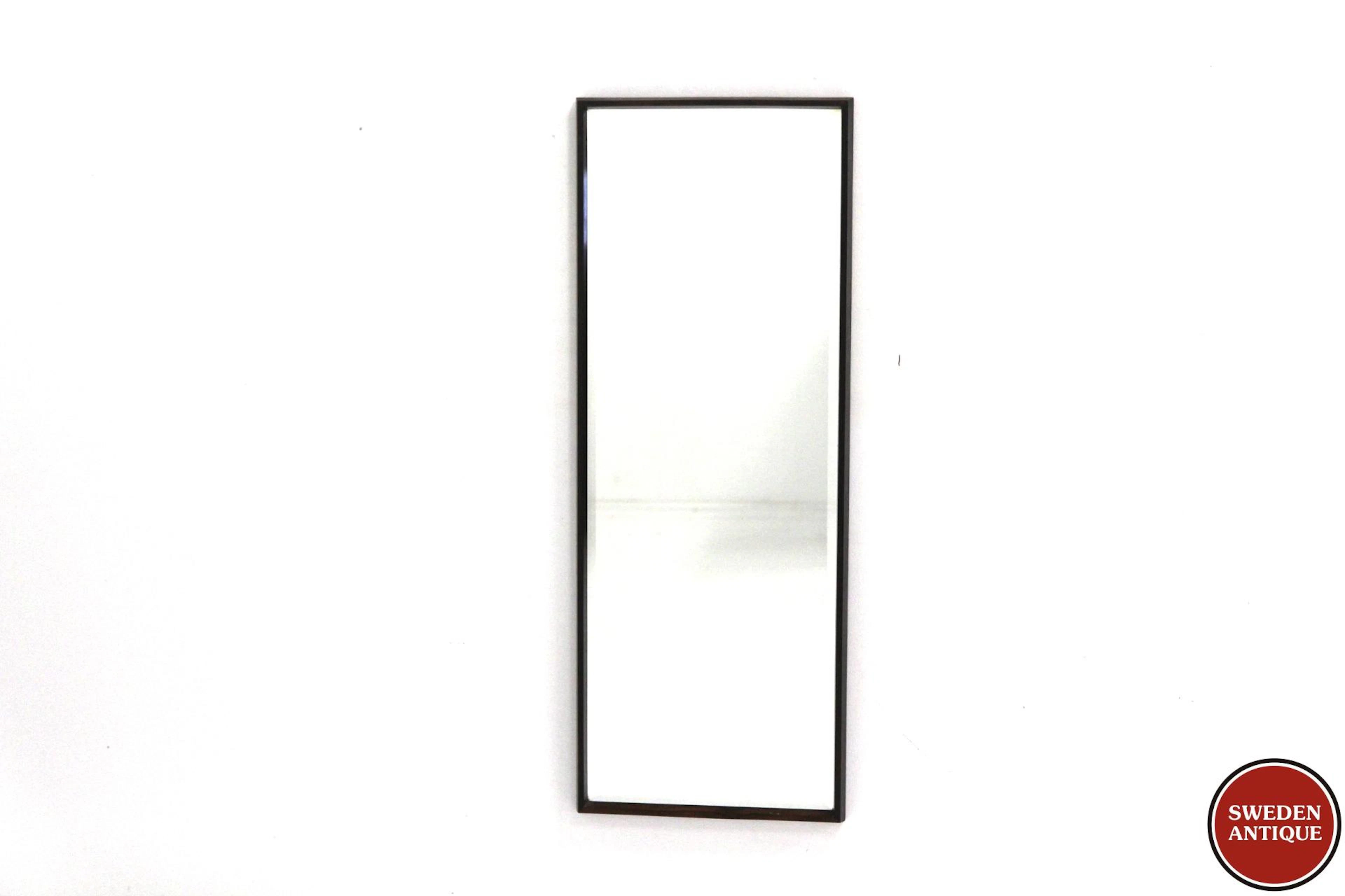 Mirrorwith beveled glass Year: 1960s Origin: Den. Material: Rosewood