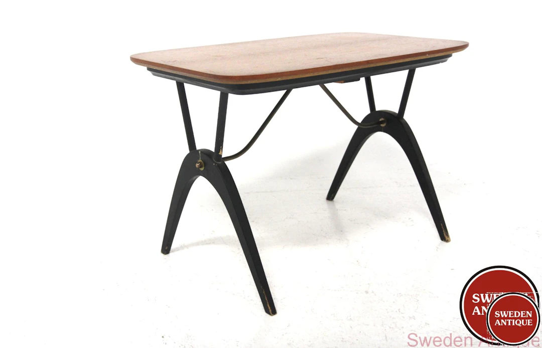 Coffee table Year: 1950s Origin: Swe. Material: Teak Black Metal W:
