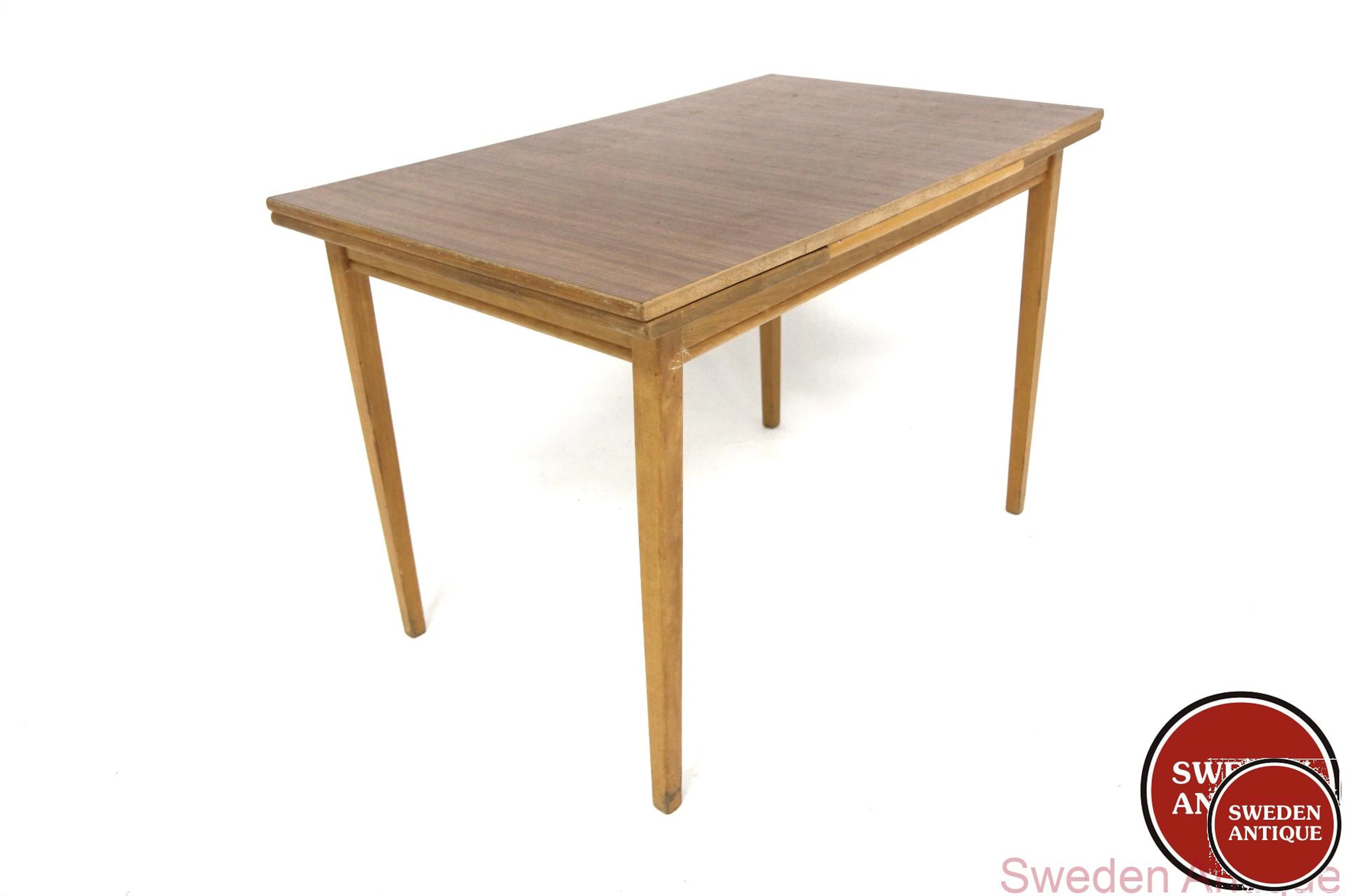 Dining table Year: 1950s Origin: Swe. Material: Beech Formica W: 109