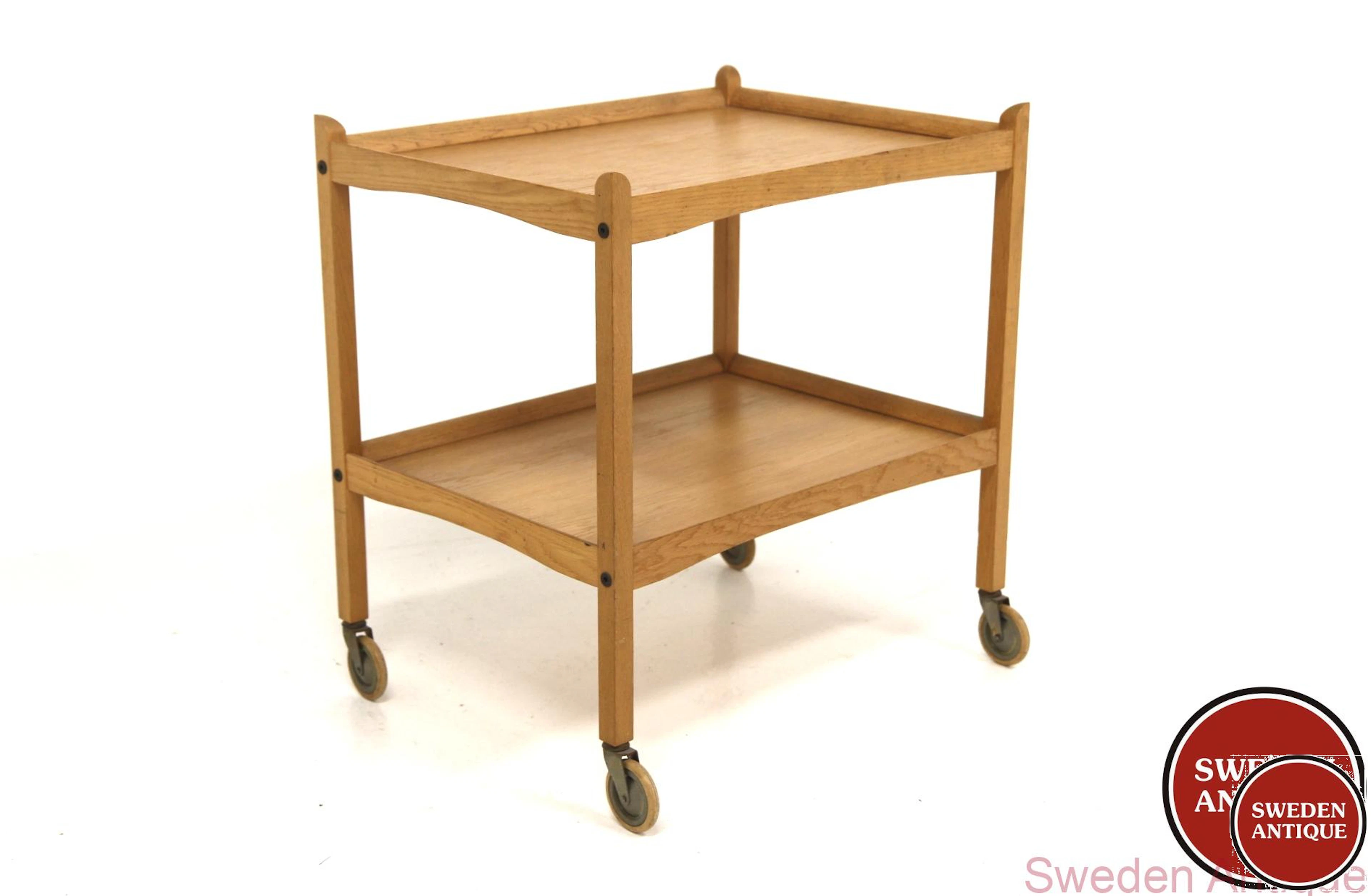 Trolley / serving cart Year: 1960s Origin: Swe. Material: Oak W: 64cm