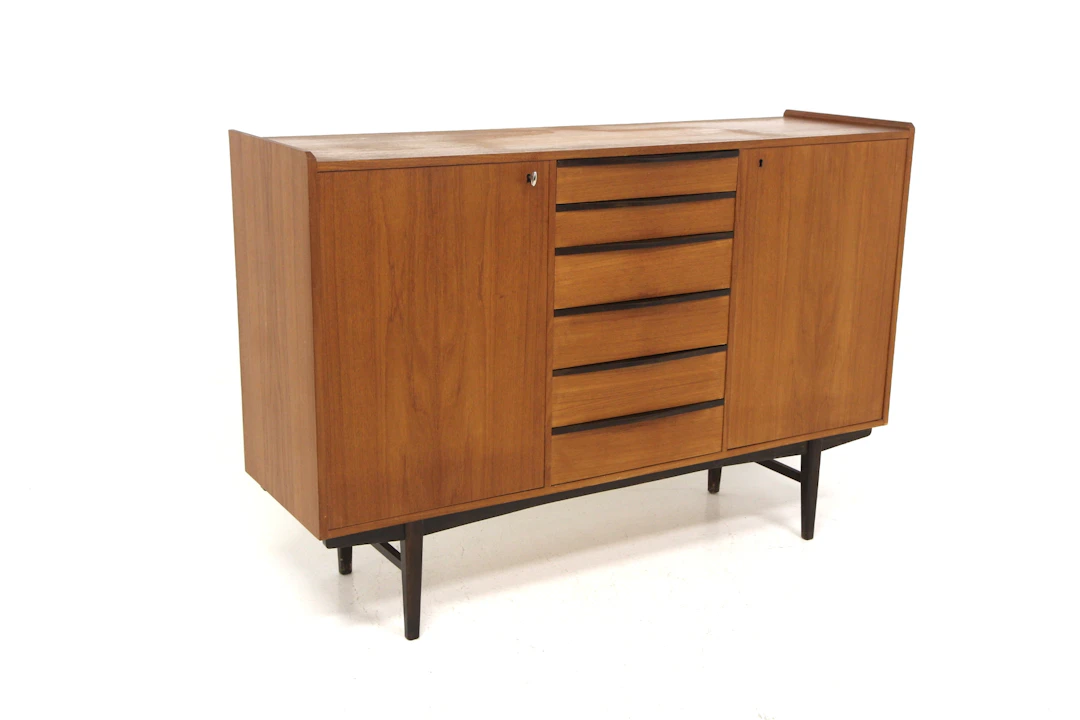 Sideboard / Highboard Year: 1950s Origin: Swe. Material: Teak Beech