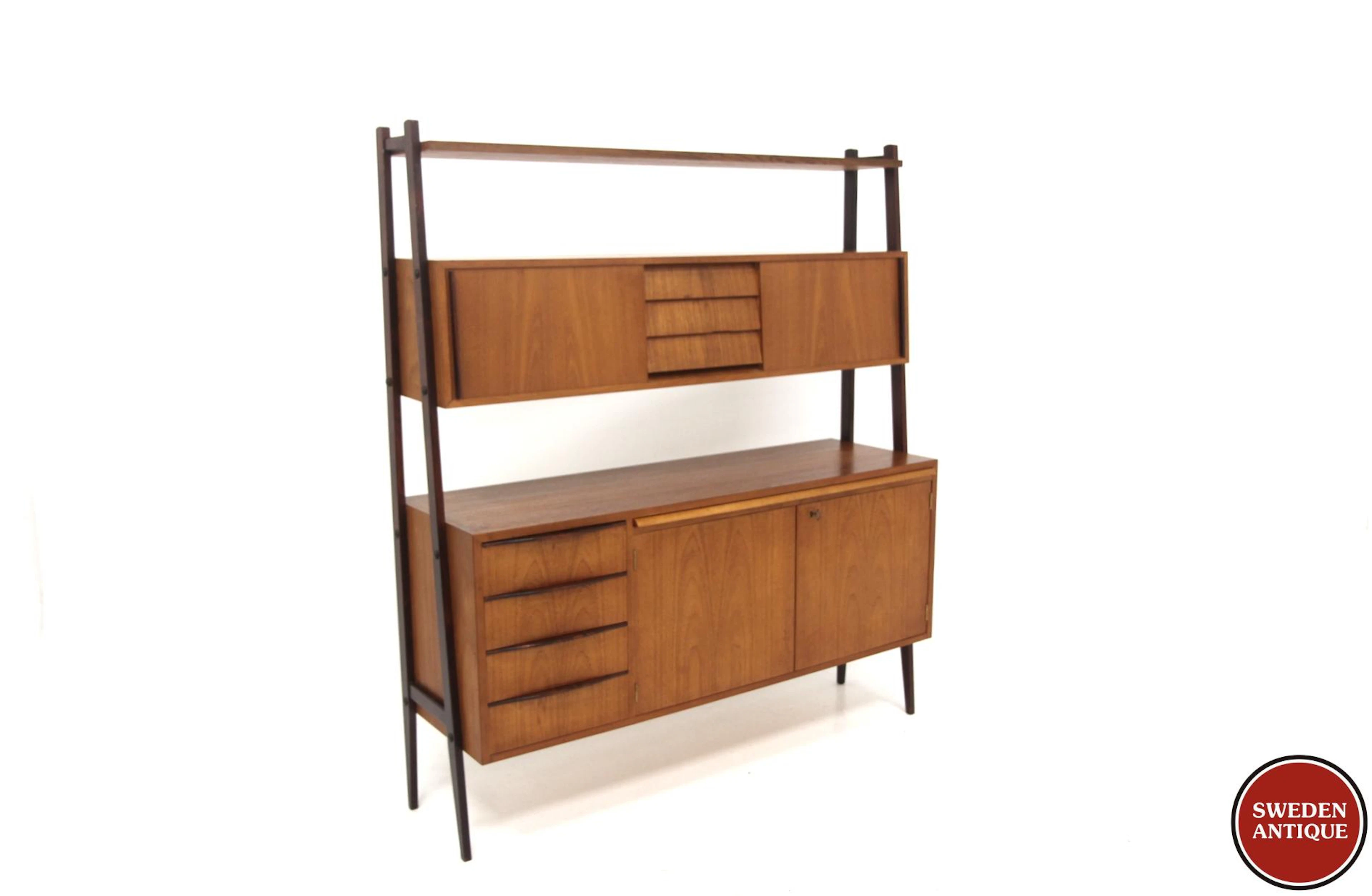 Bookshelf Year: 1950s Origin: Swe. Material: Teak Beech W: 140cm D: