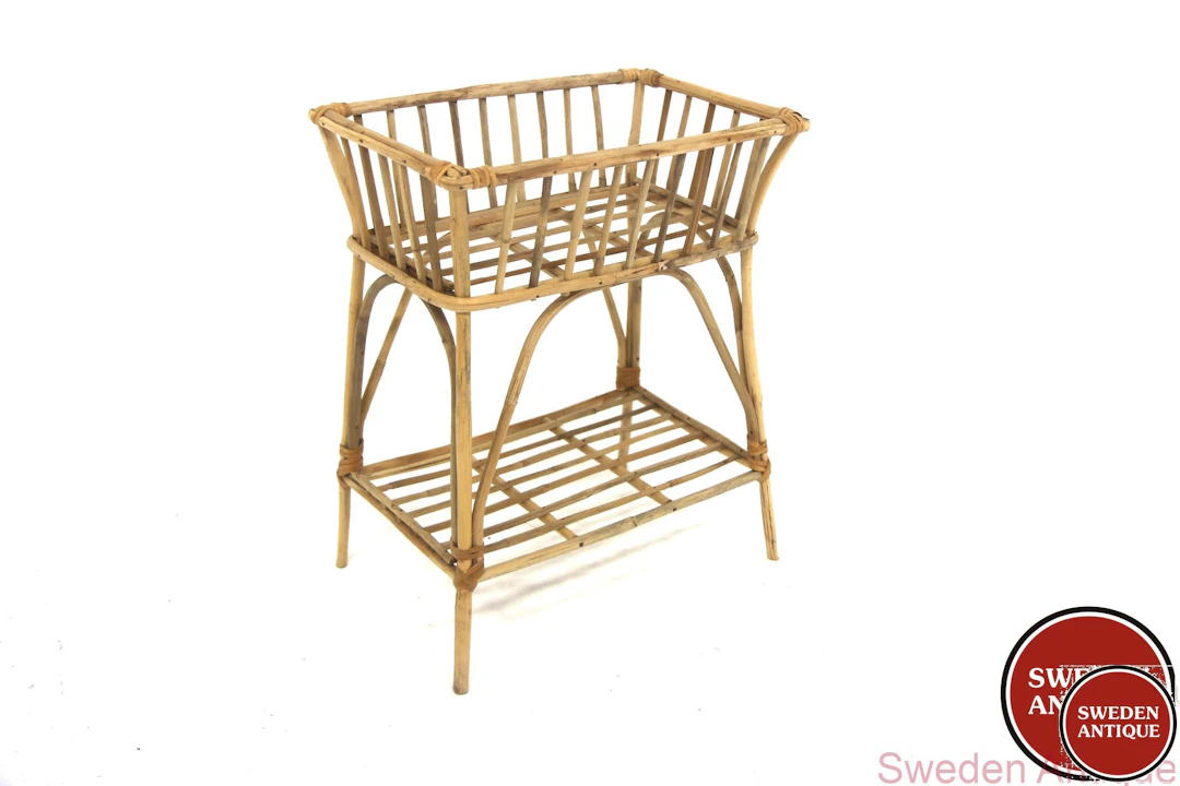 Flower stand Year: 1960s Origin: Swe. Material: Rattan W: 42cm D: