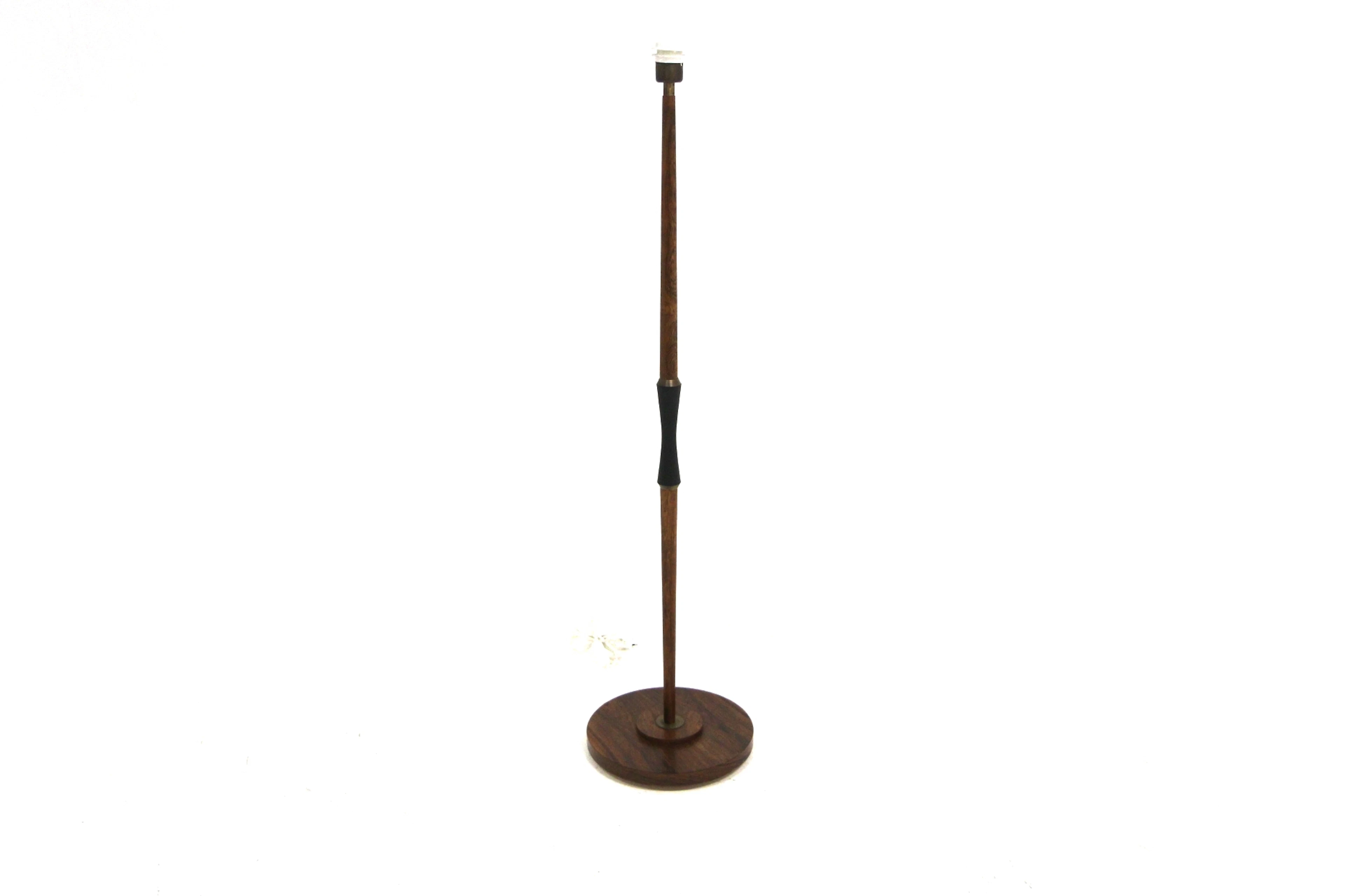Floor lamp Year: 1960s Origin: Swe. Material: Rosewood Black Metal