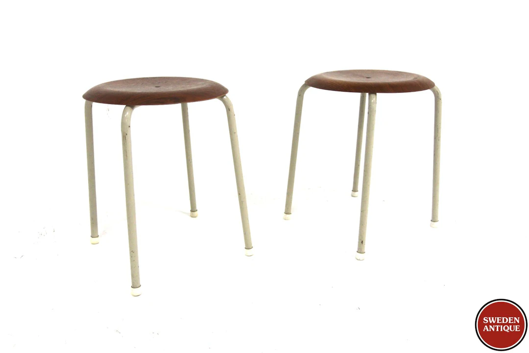 2Pcs Stools Year: 1950s Origin: Swe. Material: Teak Metal W: 38cm