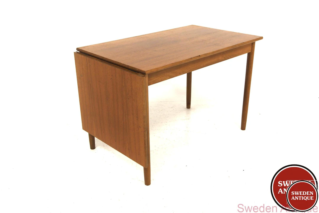 Side table Year: 1960s Origin: Swe. Material: Teak Beech Oak W: 100