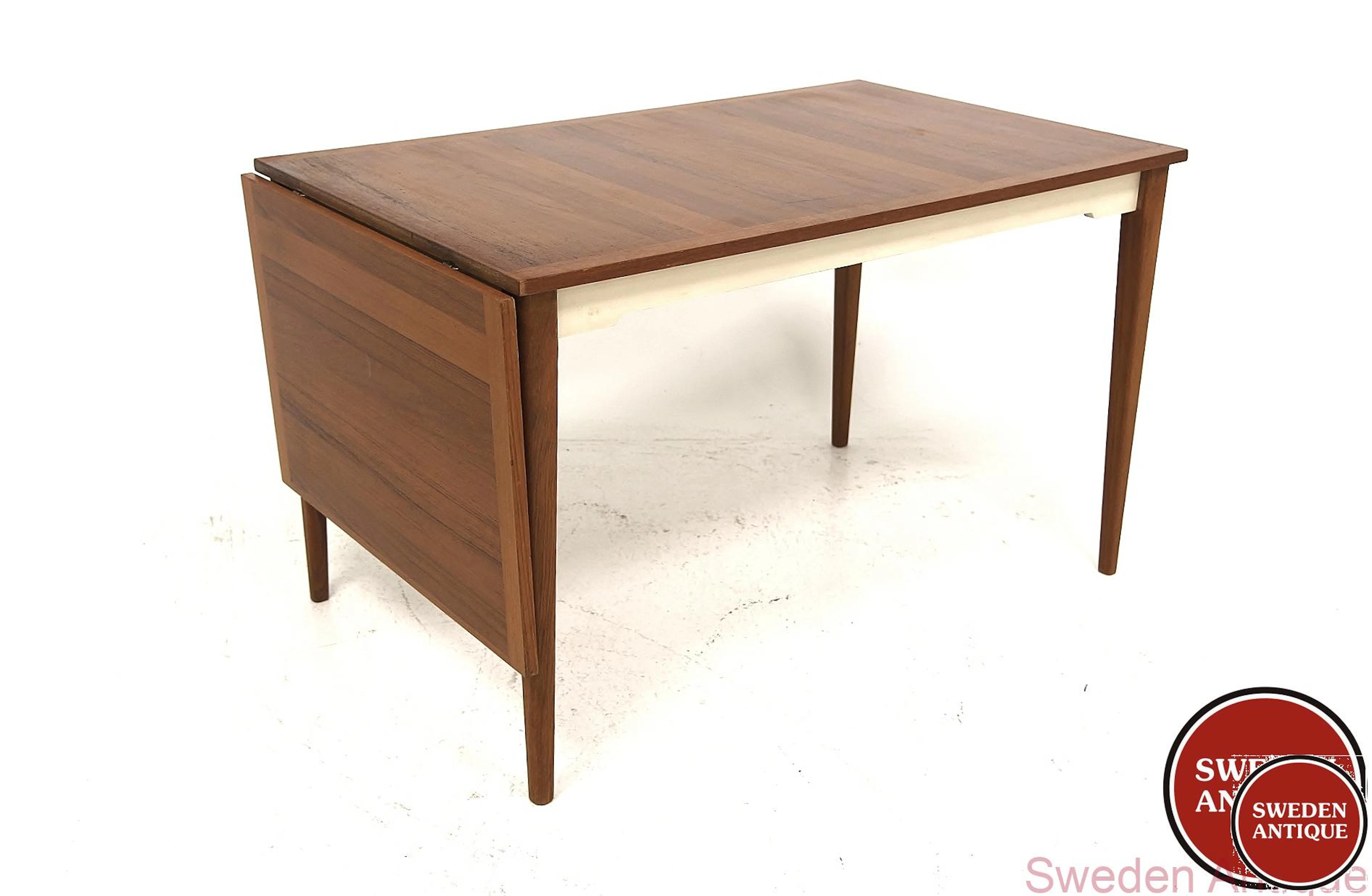 Dining table Year: 1960s Origin: Swe. Material: Teak Grey W: 120 +50cm