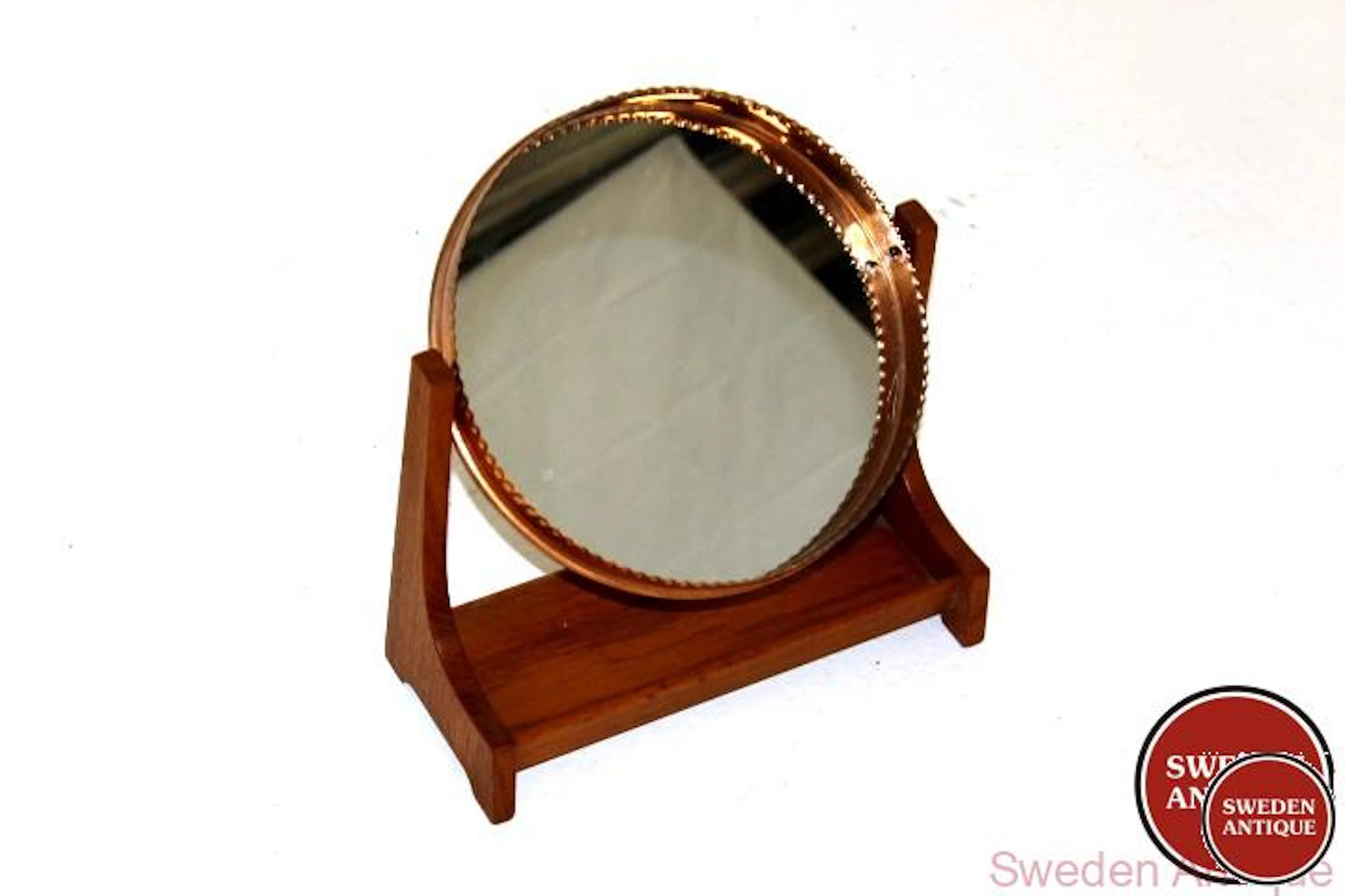 Table mirror Year: 1960s Origin: Swe. Material: Teak Metal Glass W: