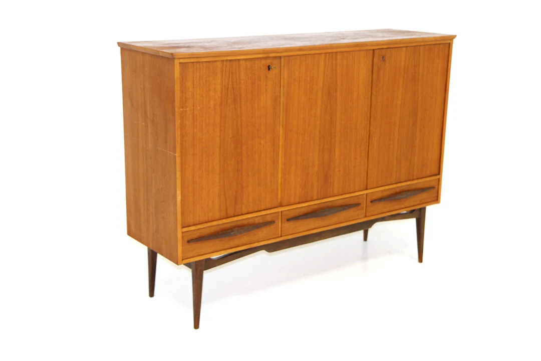 Sideboard / Highboard Year: 1950s Origin: Swe. Material: Teak Beech
