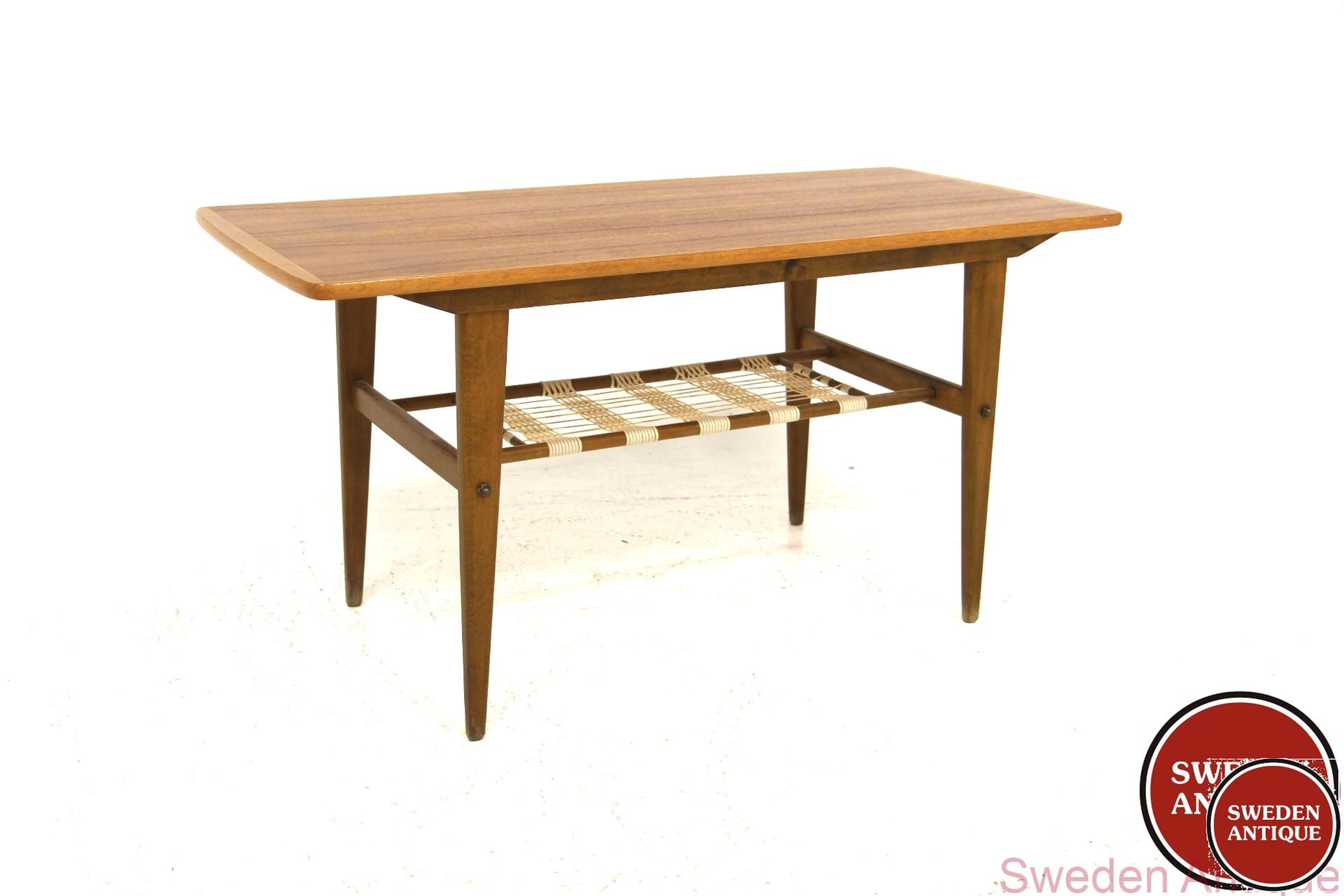 Coffee table Year: 1950s Origin: Swe. Material: Teak Beech Plastic