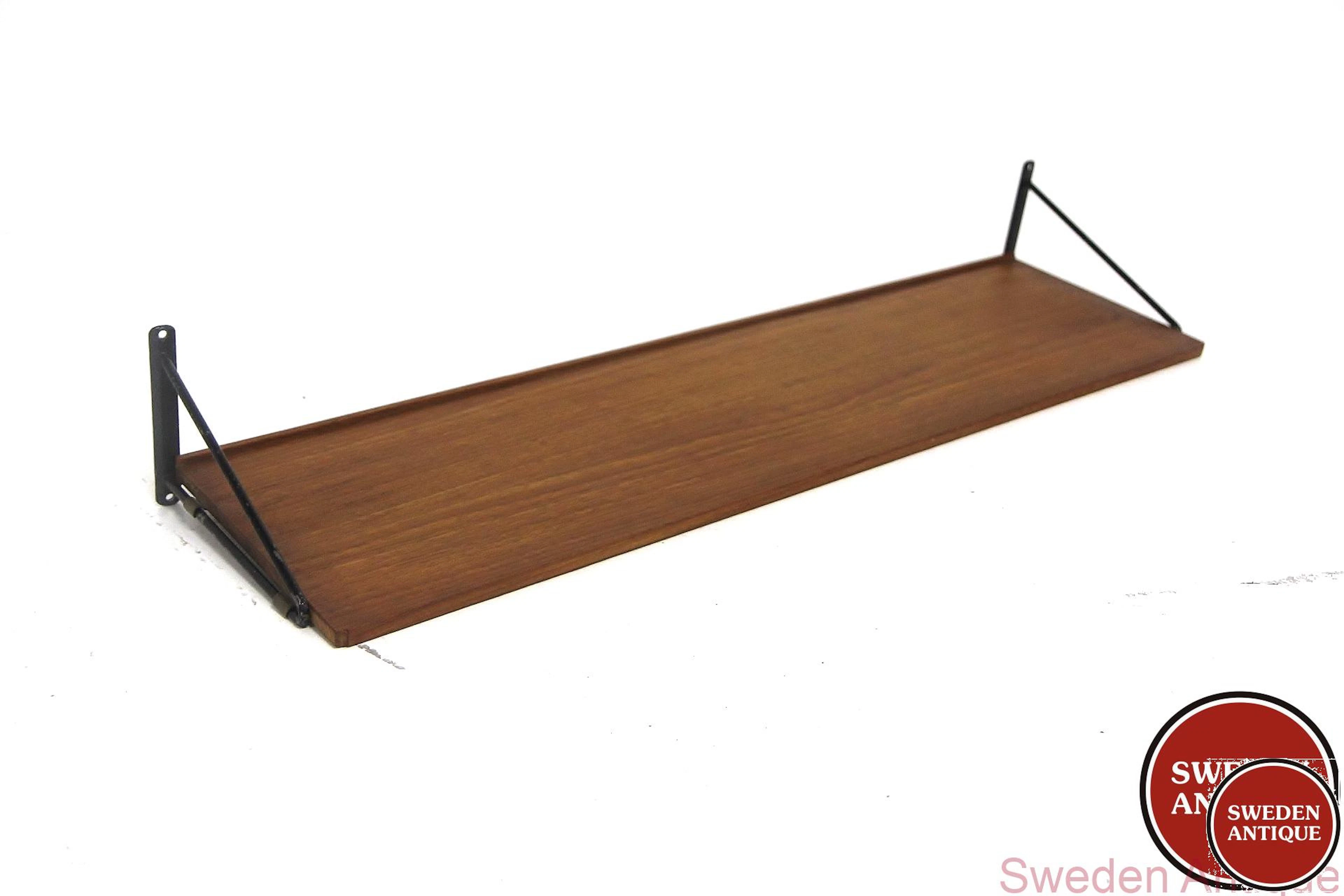 Wall shelf Year: 1950s Origin: Swe. Material: Teak Metal W: 83cm D: