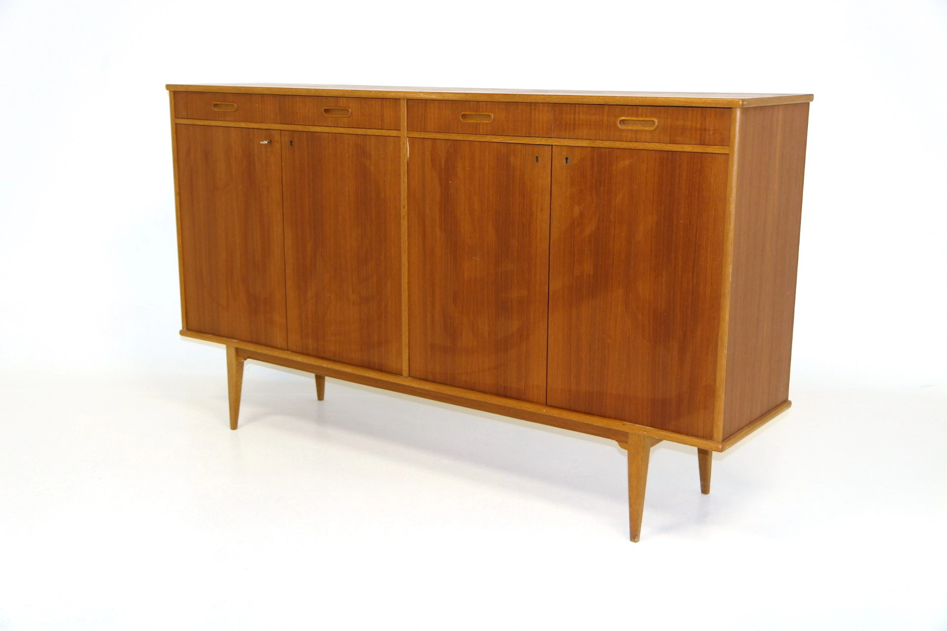 Sideboard / Highboard Year: 1960s Origin: Swe. Material: Teak Oak
