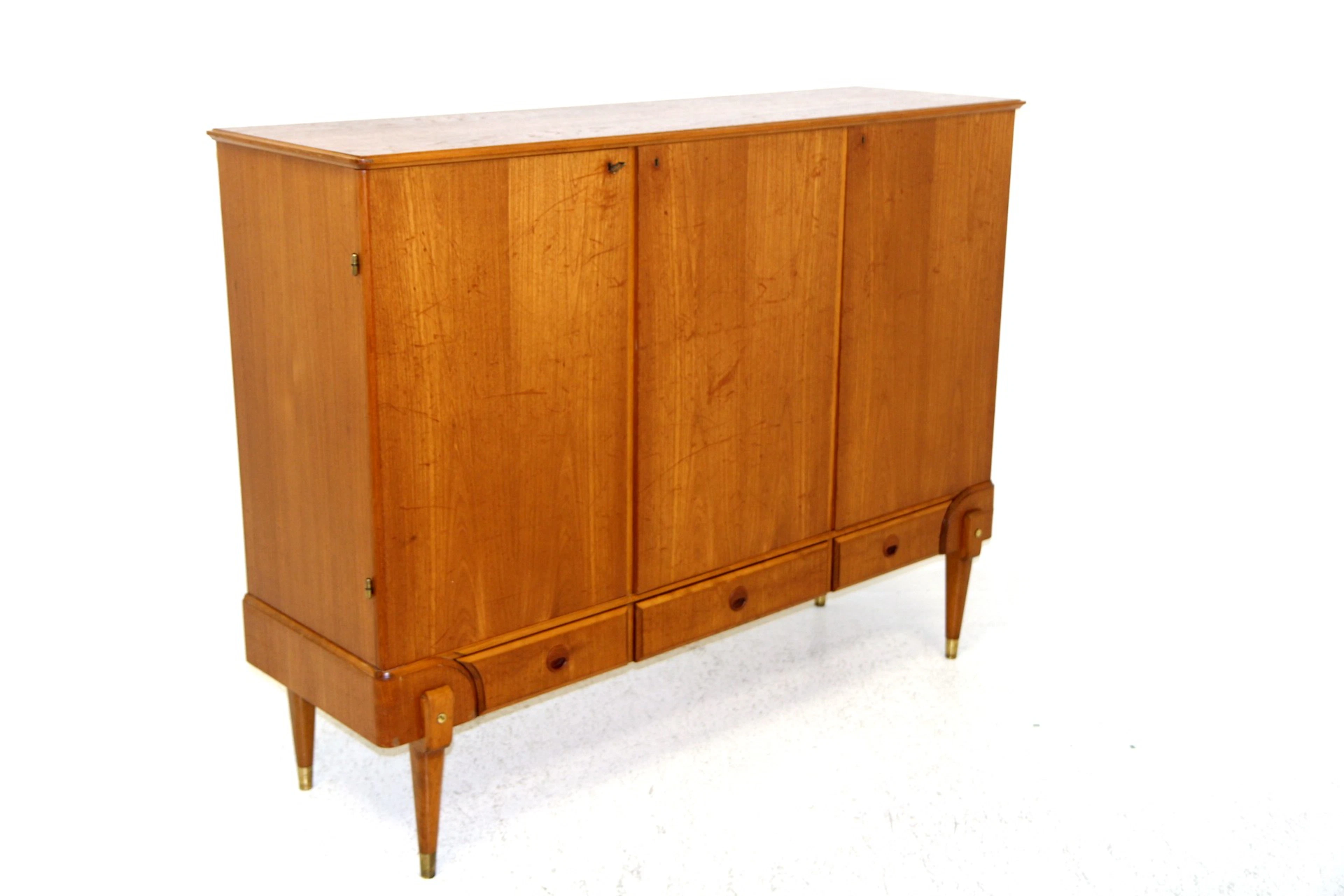 Sideboard / Highboard Year: 1960s Origin: Swe. Material: Teak Metal