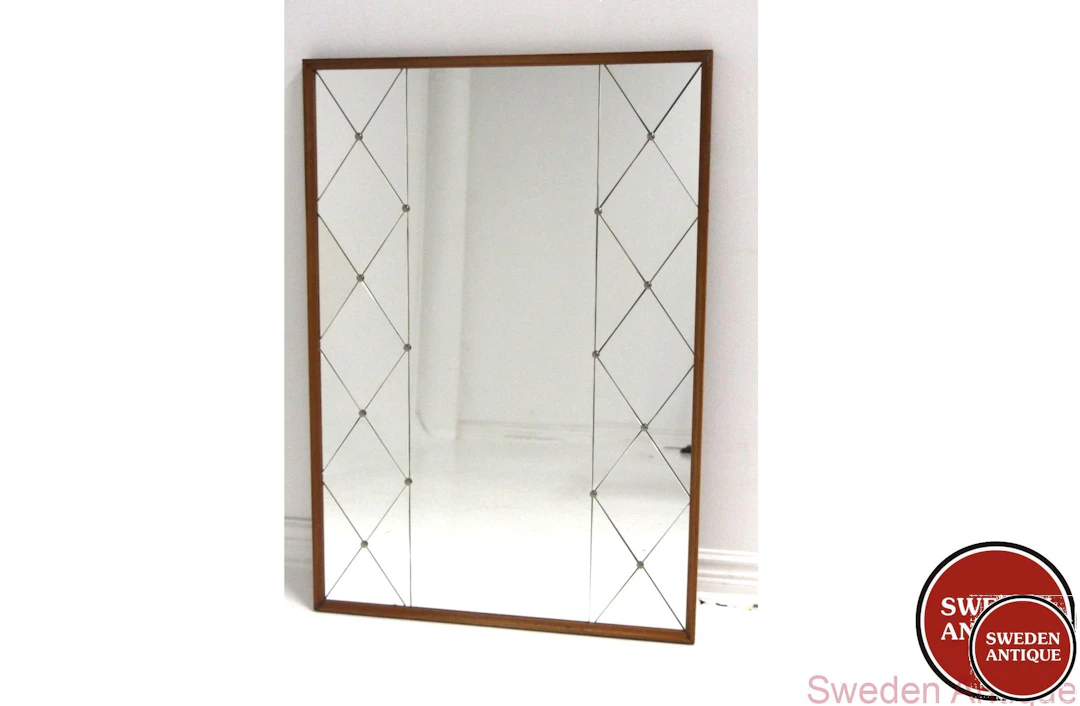 Mirror Year: 1950s Origin: Swe. Material: Teak Glass W: 82cm D: 3,5cm H: 118cm