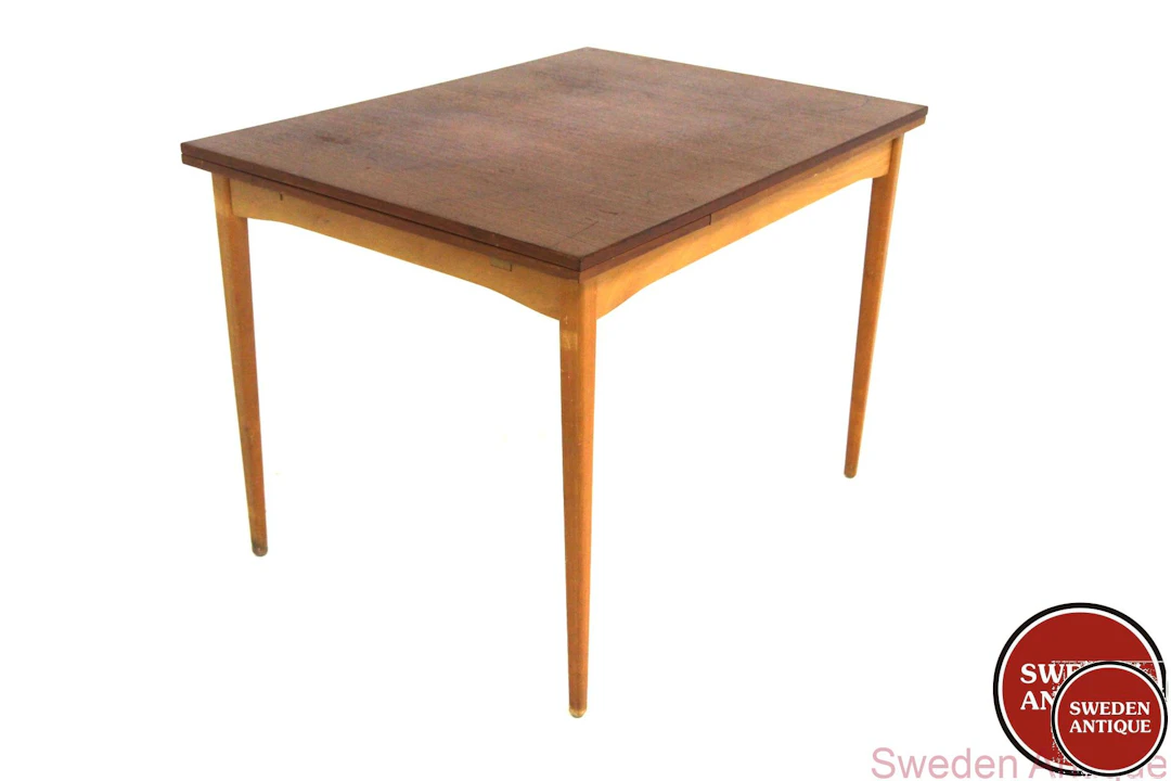 Dining table Year: 1950s Origin: Swe. Material: Teak Beech W: 102