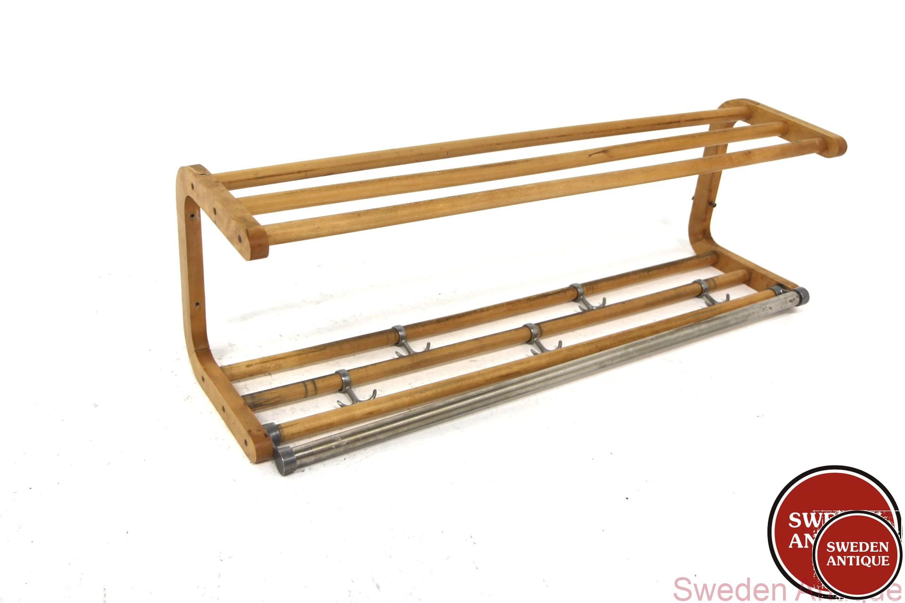 Coat hanger Year: 1940s Origin: Swe. Material: Birch Metal W: 100cm