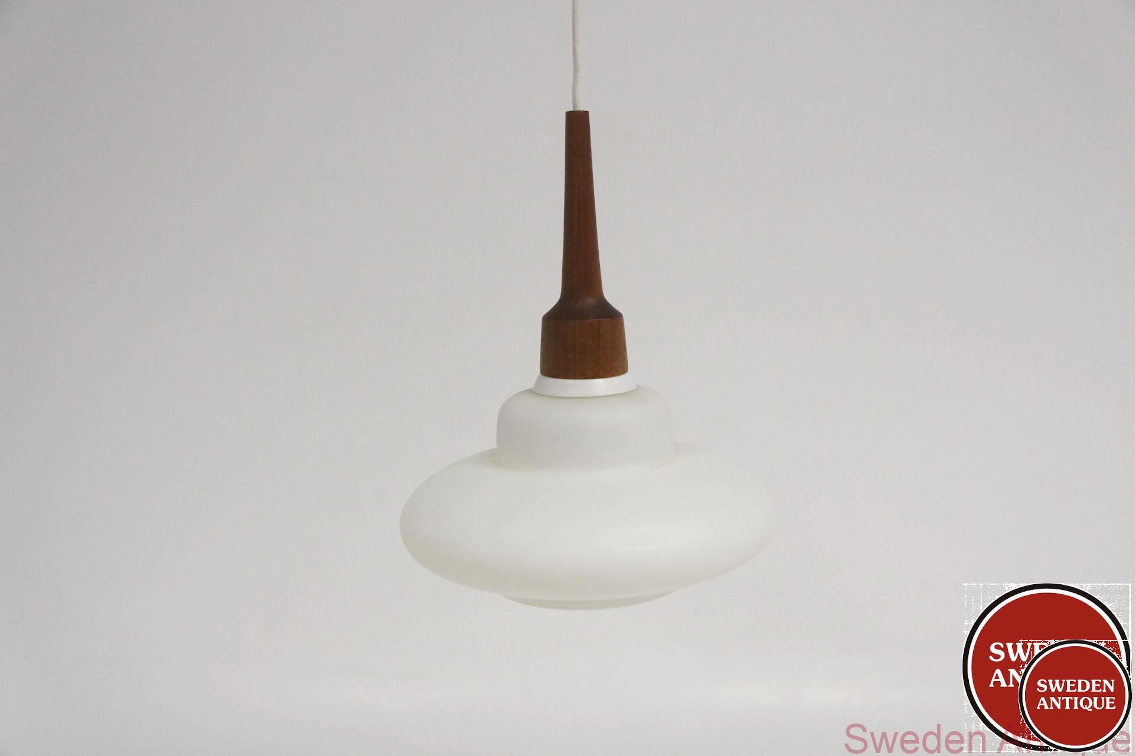 Ceiling lamp Year: 1950s Origin: Swe. Material: Glass Teak W: 25cm H: 33cm