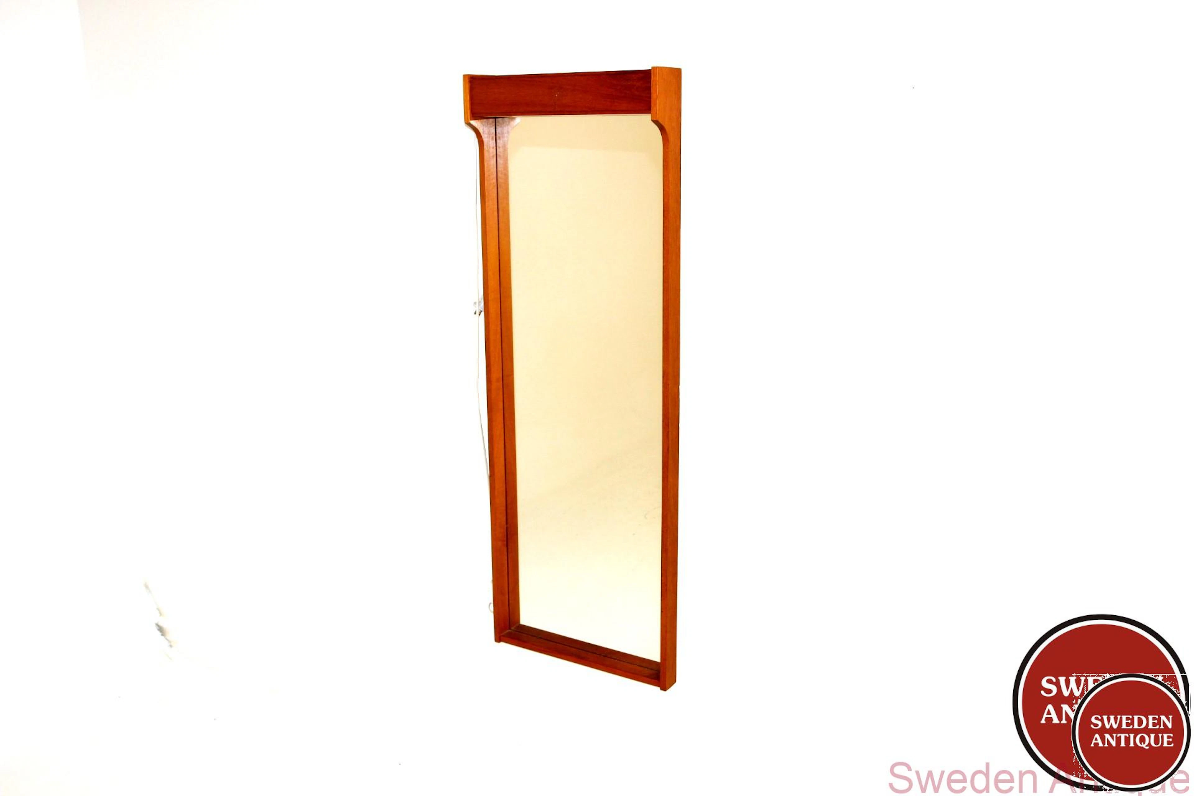 Mirror Year: 1960s Origin: Swe. Material: Teak Glass W: 44cm D: 8,5cm H: 123cm