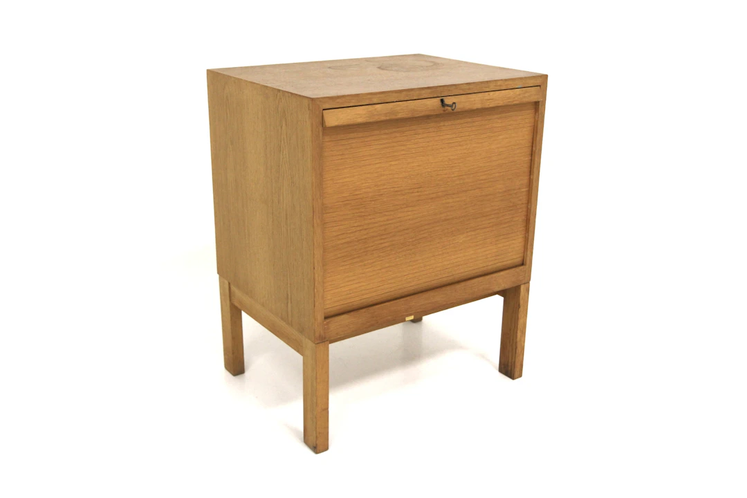 Cabinet Tambourine door Year: 1960s Origin: Swe. Material: Oak W: