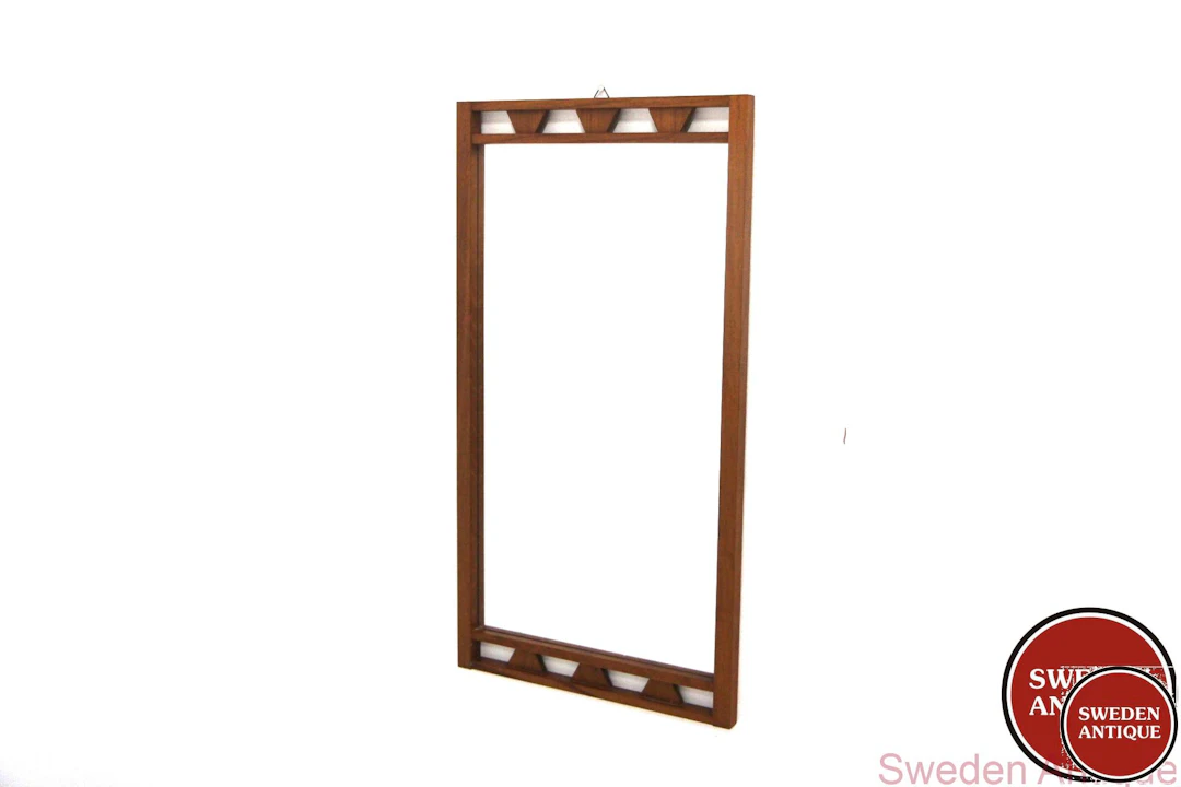 Mirror Year: 1960s Origin: Swe. Material: Teak Glass W: 38cm D: 2cm H: 72cm