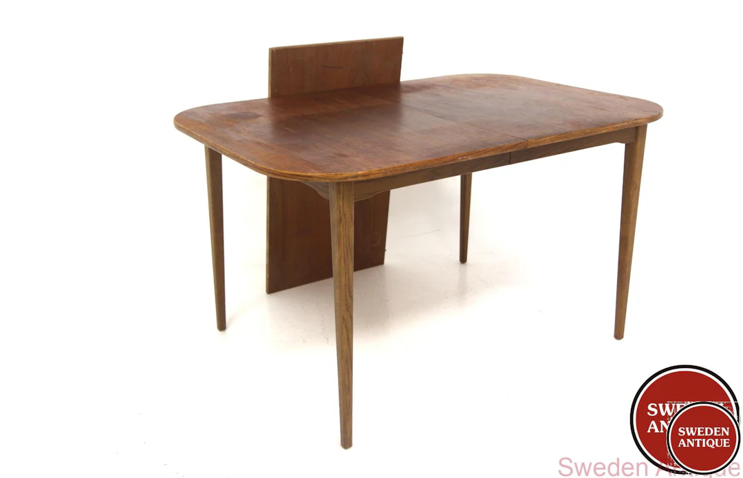 Dining table Year: 1950s Origin: Swe. Material: Teak Oak W: 128 +50cm
