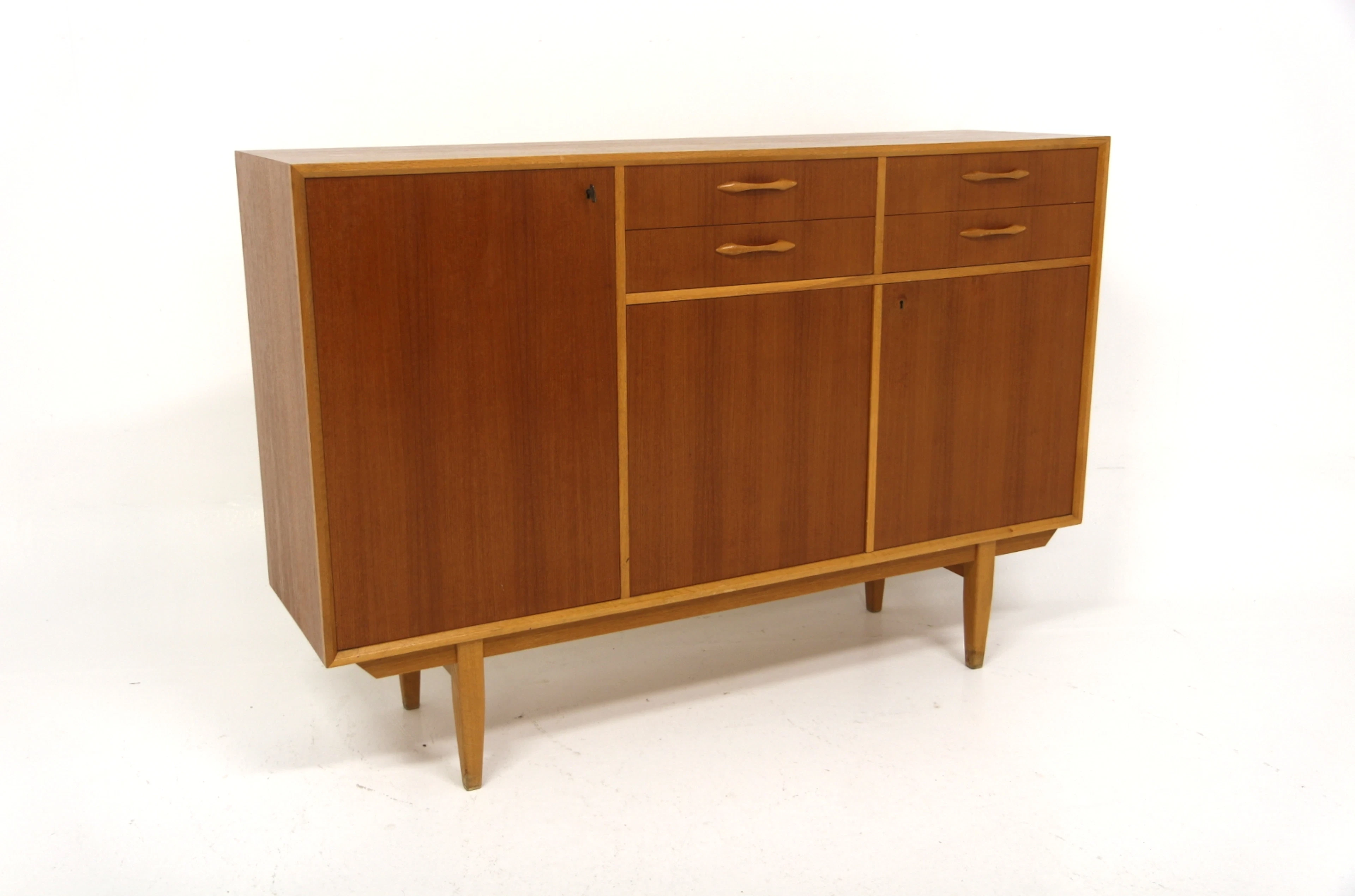 Sideboard / Highboard Year: 1950s Origin: Swe. Material: Teak Oak