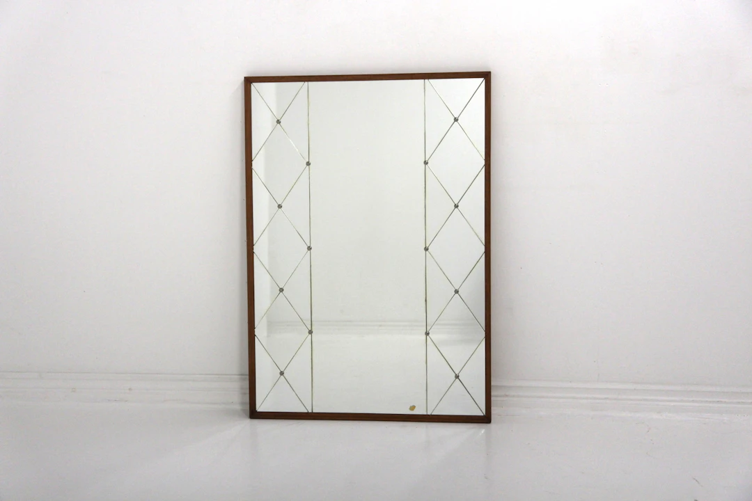 Mirror Year: 1950s Origin: Swe. Material: Teak Glass Metal W: 83cm