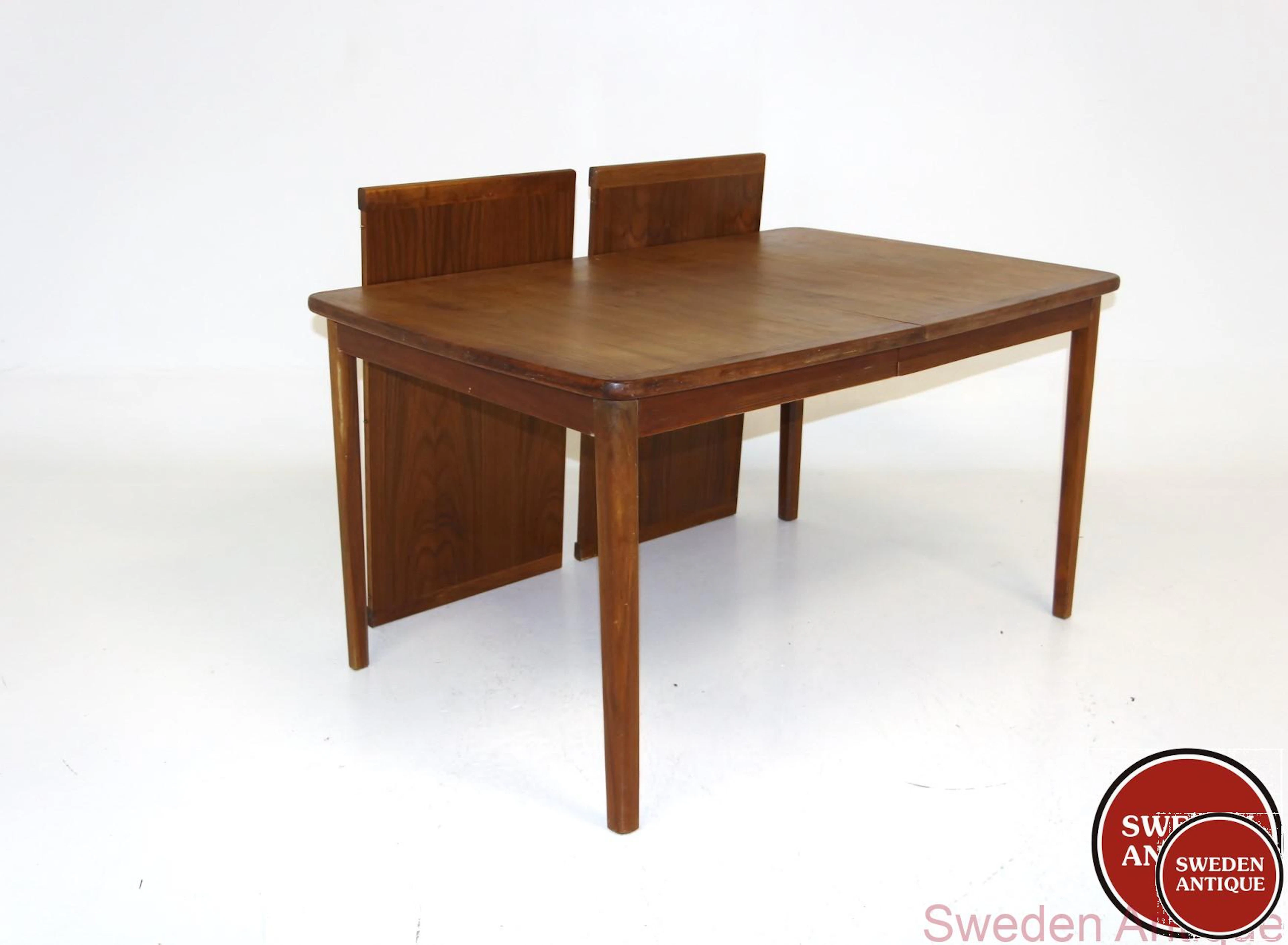 Dining table Year: 1960s Origin: Swe. Material: Teak W: 134 +49,5