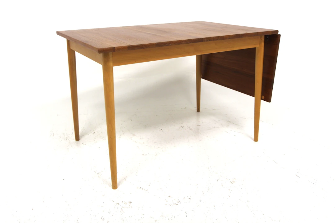 Dining table Year: 1960s Origin: Swe. Material: Teak Beech W: 109