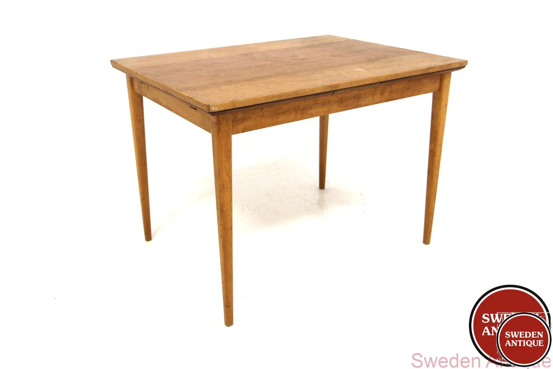 Dining table Year: 1950s Origin: Swe. Material: Teak Beech W: 100