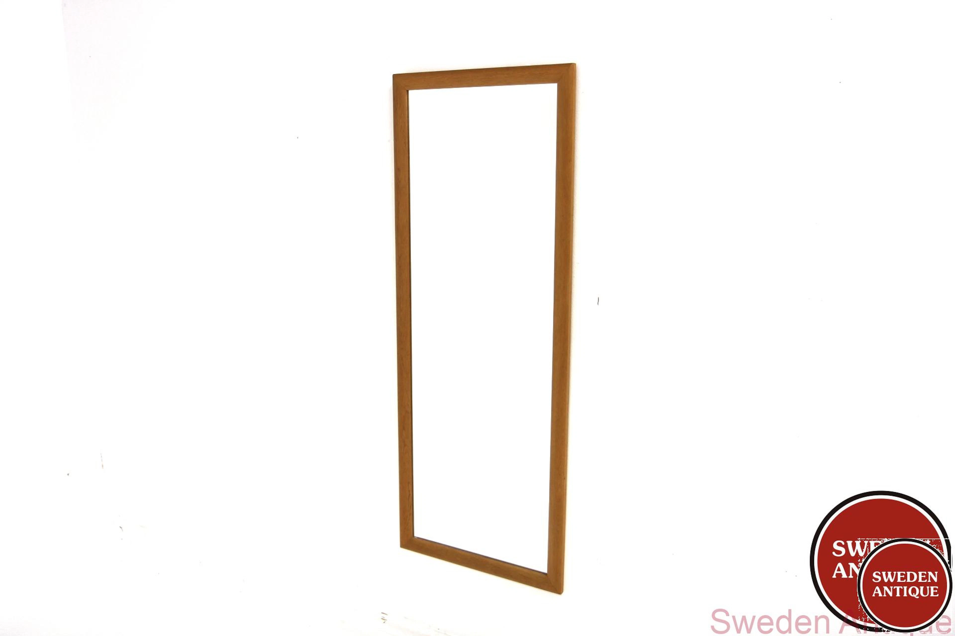 Mirror Year: 1960s Origin: Swe. Material: Oak Glass W: 49cm D: 2cm H: 127cm