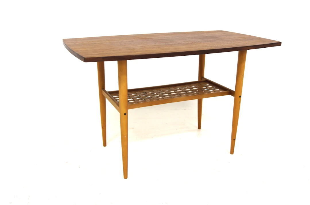 Coffee table Year: 1950s Origin: Swe. Material: Teak Beech W: 92cm