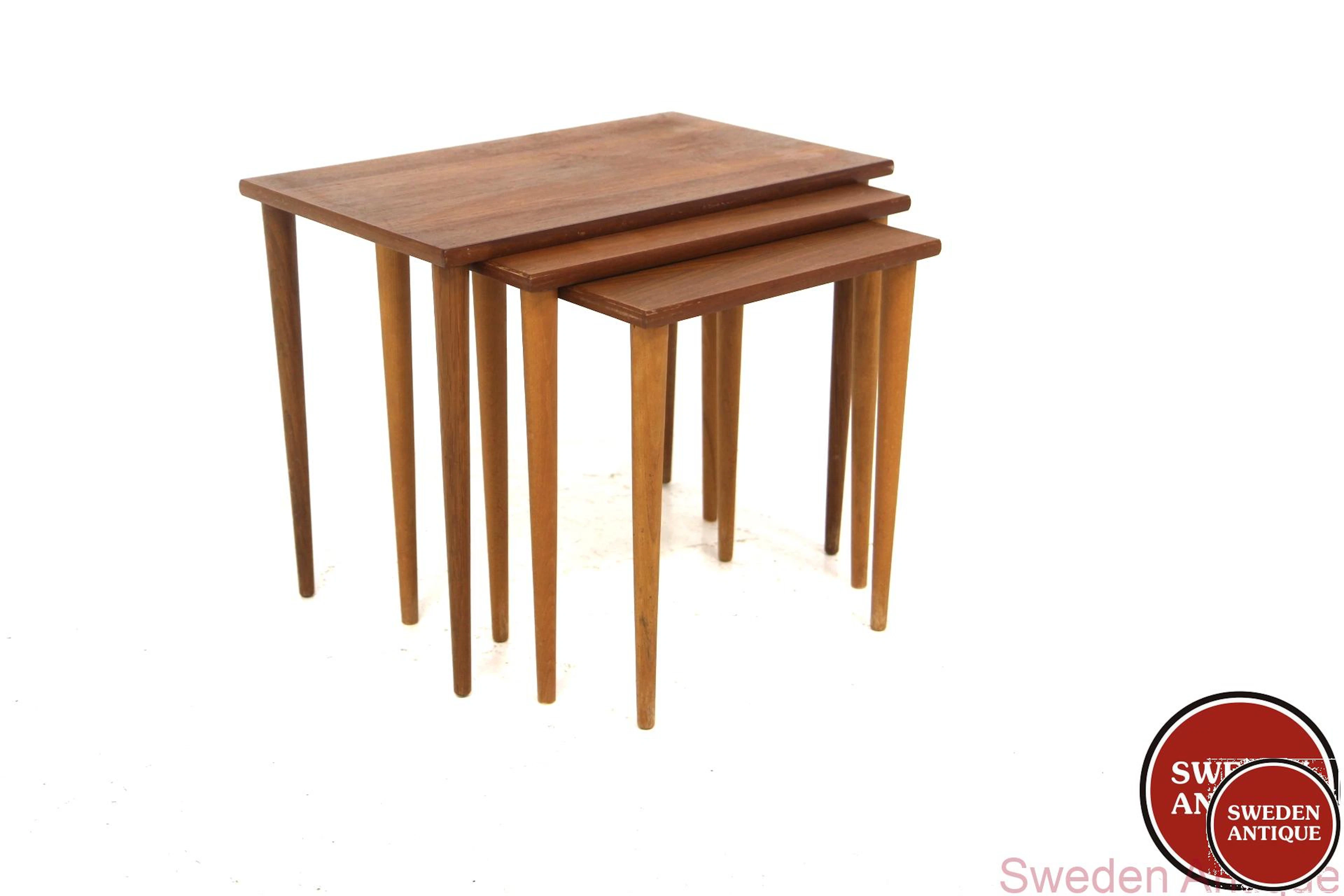 Nesting table Year: 1960s Origin: Swe. Material: Teak Beech W: 56cm