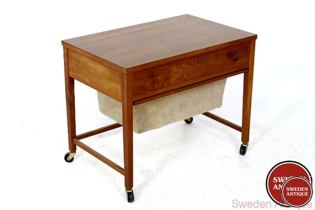 Sewing table Year: 1950s Origin: Swe. Material: Teak Fabric W: 66cm