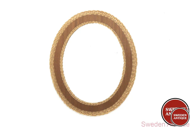 Mirror Year: 1960s Origin: Swe. Material: Teak Cane Glass W: 40cm