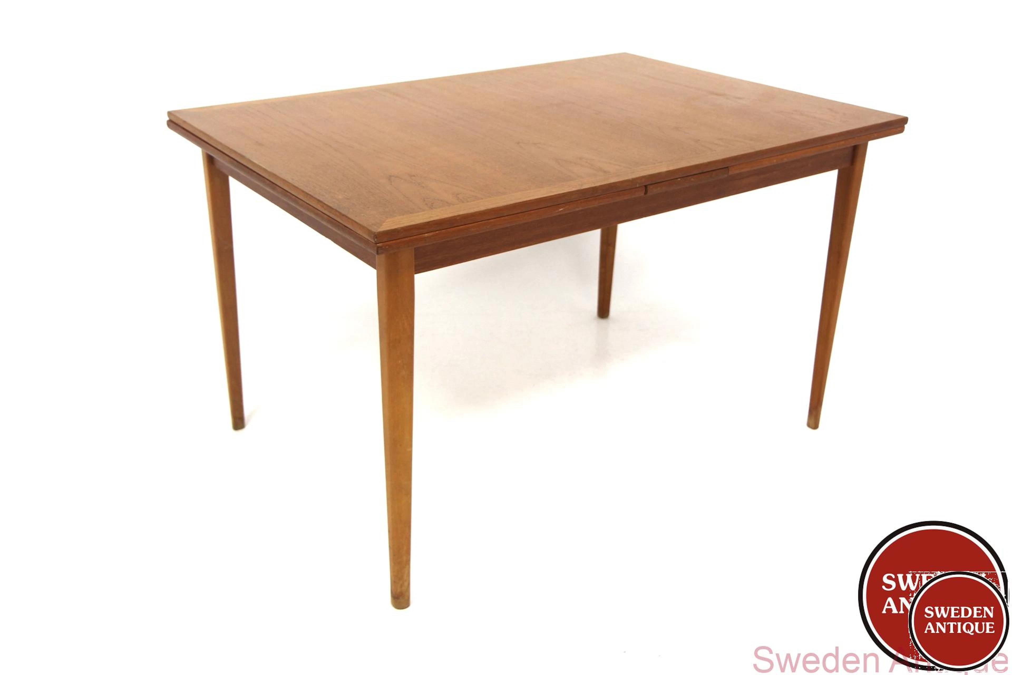 Dining table Year: 1960s Origin: Swe. Material: Teak Beech W: 120