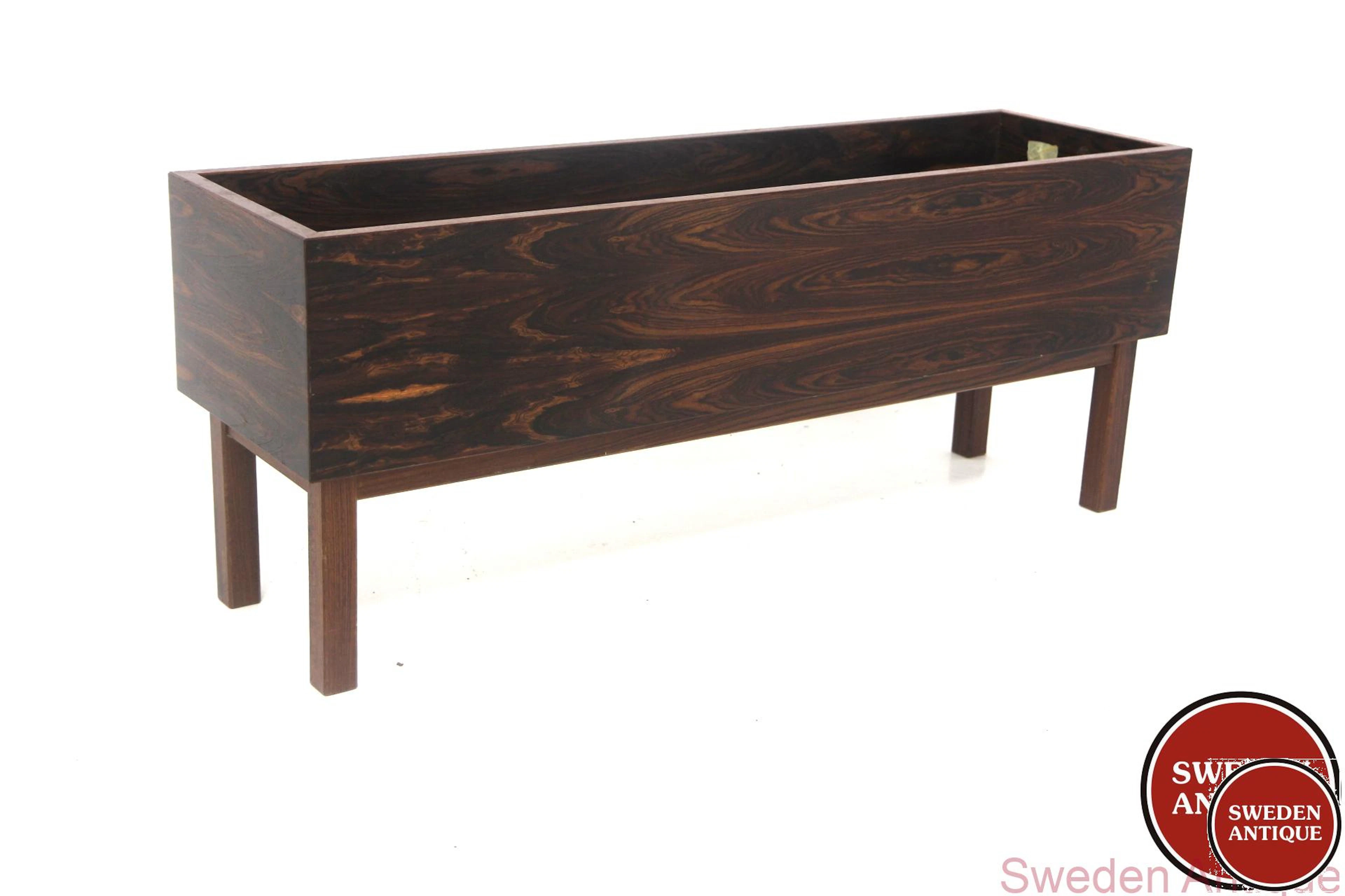 Flower stand Year: 1960s Origin: Swe. Material: Rosewood W: 124cm