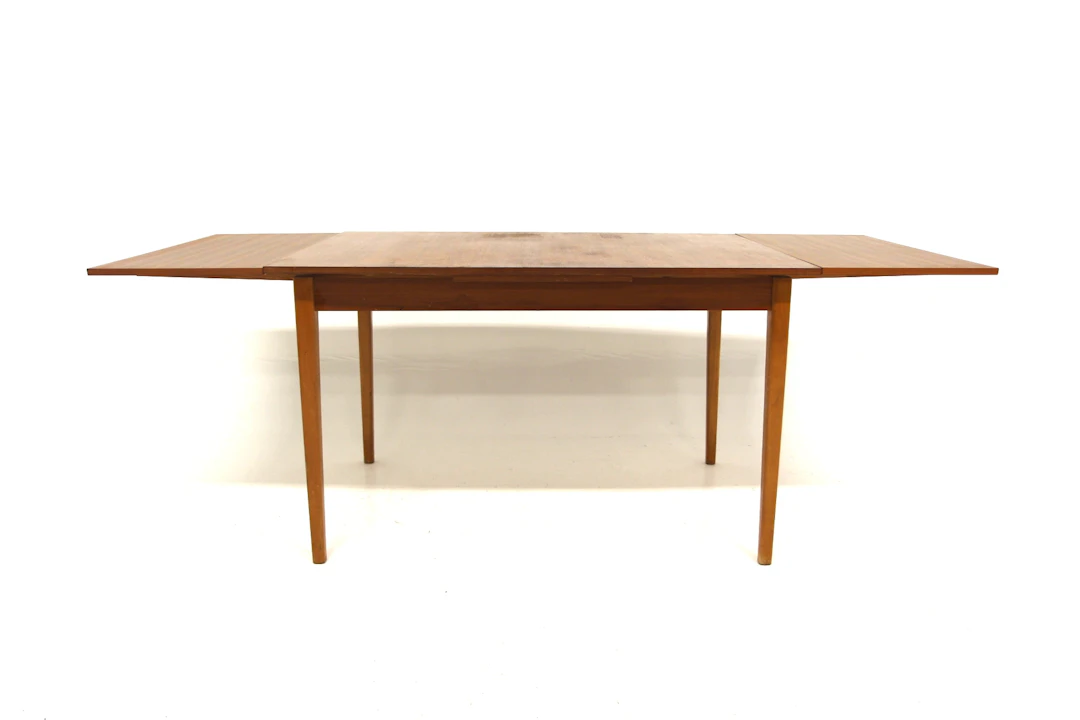 Dining table Year: 1950s Origin: Swe. Material: Teak Beech W: 122