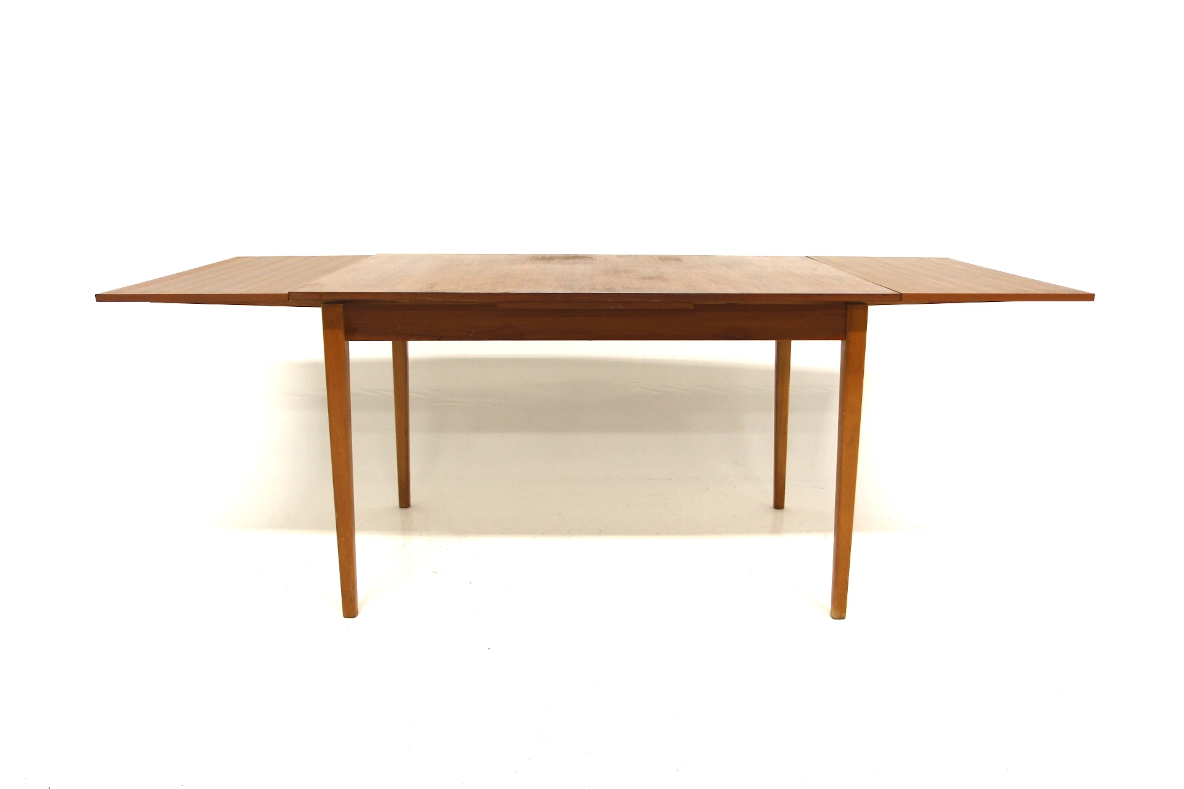 Dining table Year: 1950s Origin: Swe. Material: Teak Beech W: 122