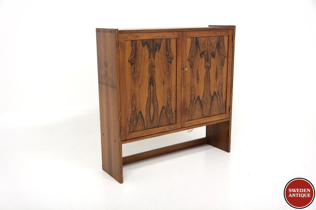 Bar cabinet Year: 1960s Origin: Swe. Material: Rosewood W: 90cm D: 25cm H: 90cm