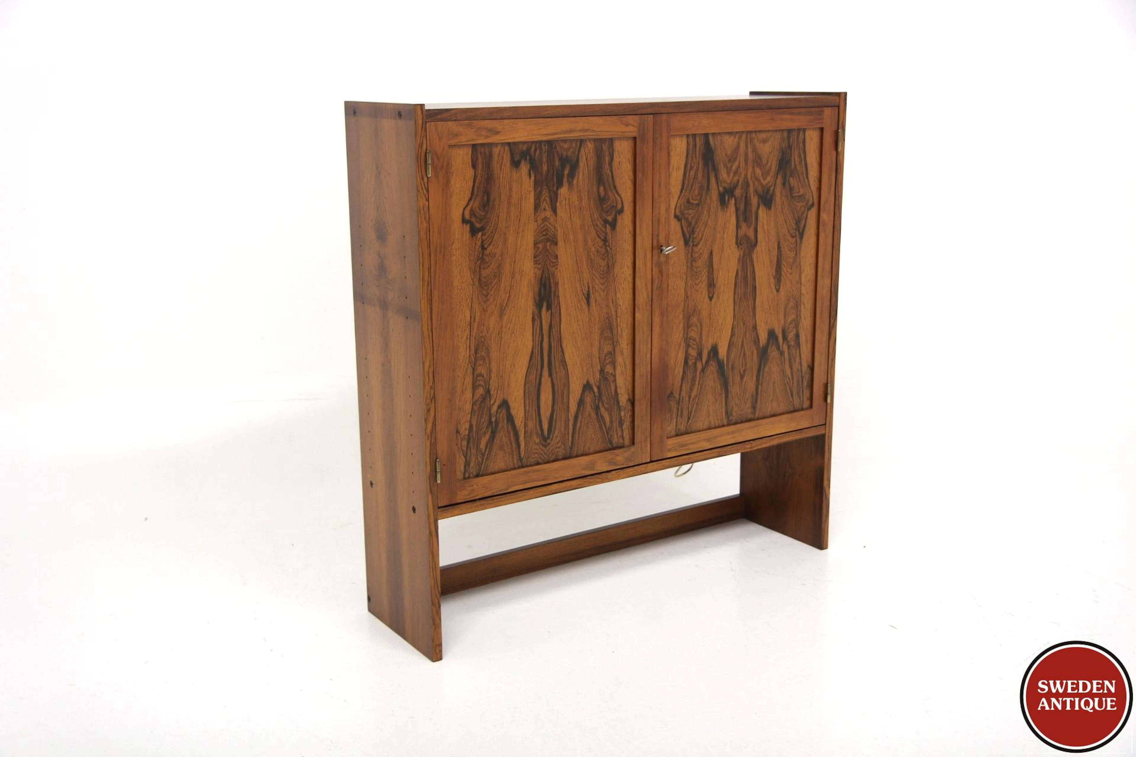 Bar cabinet Year: 1960s Origin: Swe. Material: Rosewood W: 90cm D: 25cm H: 90cm