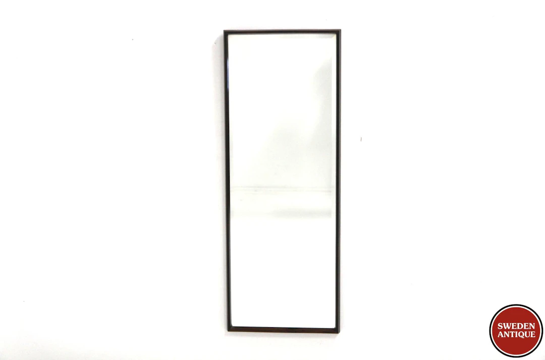 Mirrorwith beveled glass Year: 1960s Origin: Den. Material: Rosewood